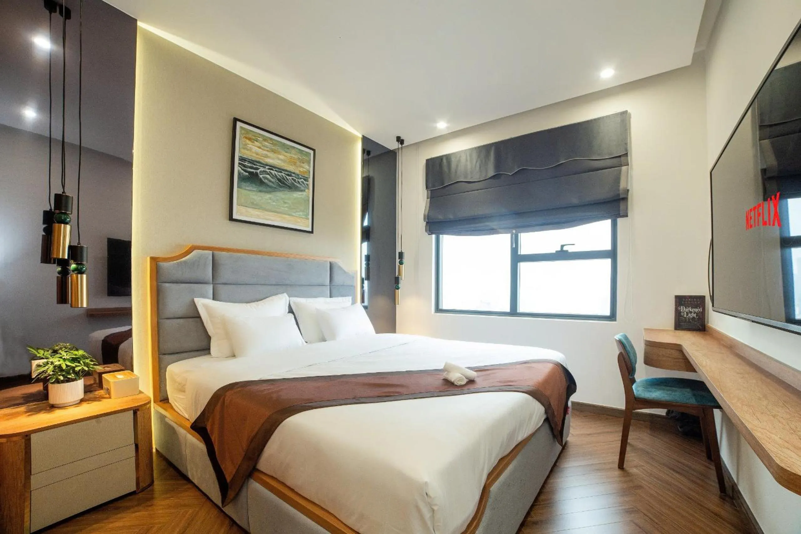 Bed in Otis Soho Saigon Balcony Apartment