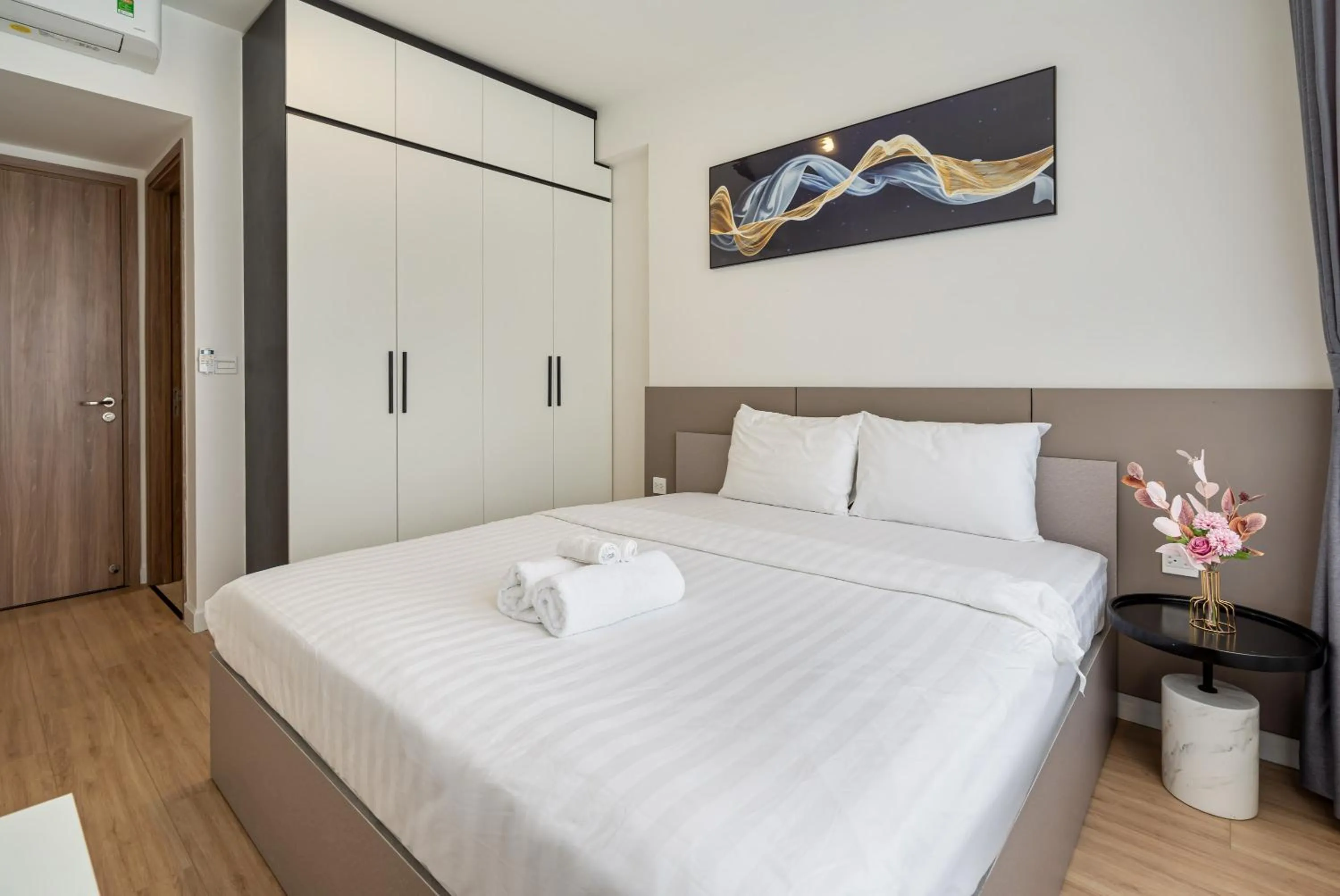 Bed in Otis Soho Saigon Balcony Apartment