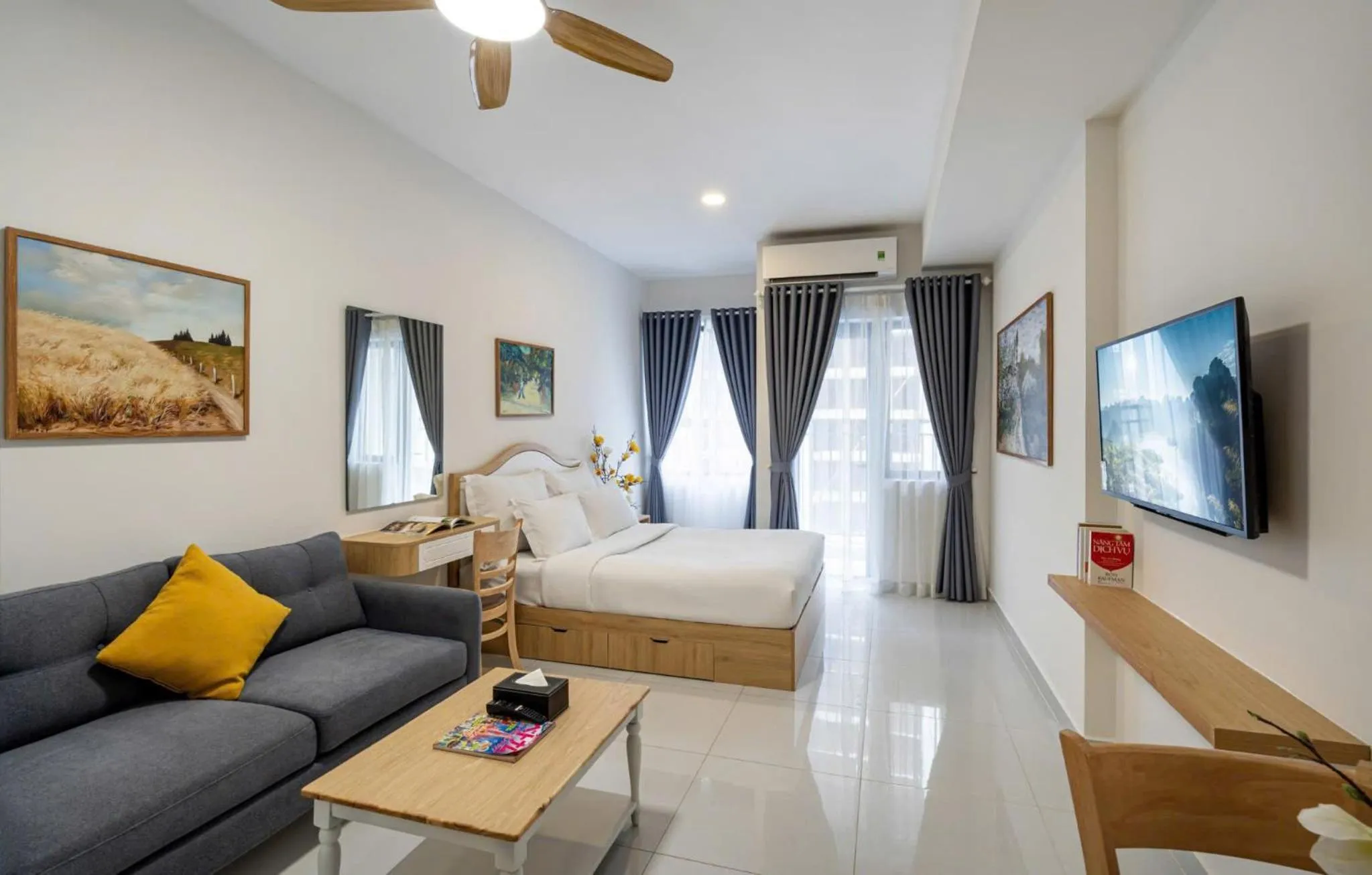 Communal lounge/ TV room, Bed in Otis Soho Saigon Balcony Apartment