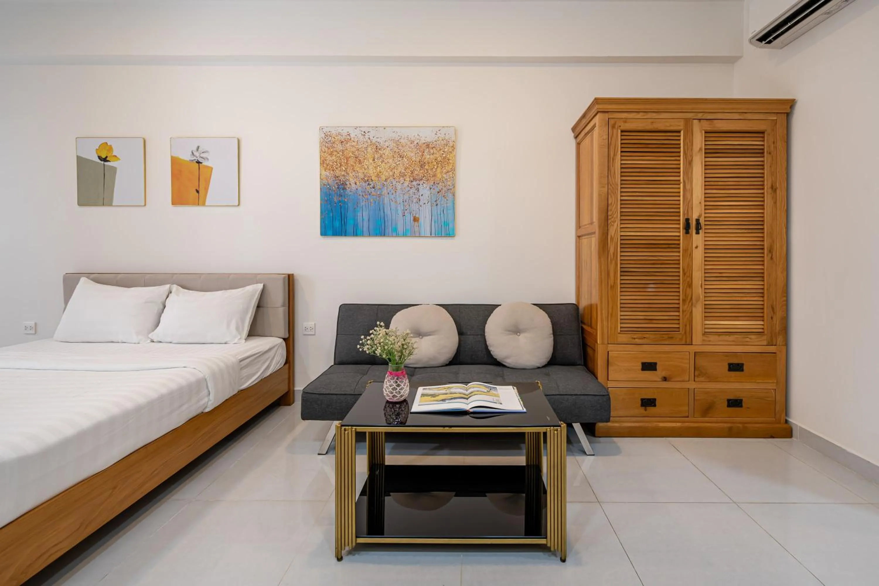 Living room, Bed in Otis Soho Saigon Balcony Apartment