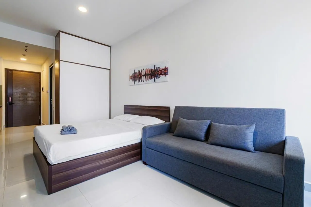 Bed in Otis Soho Saigon Balcony Apartment