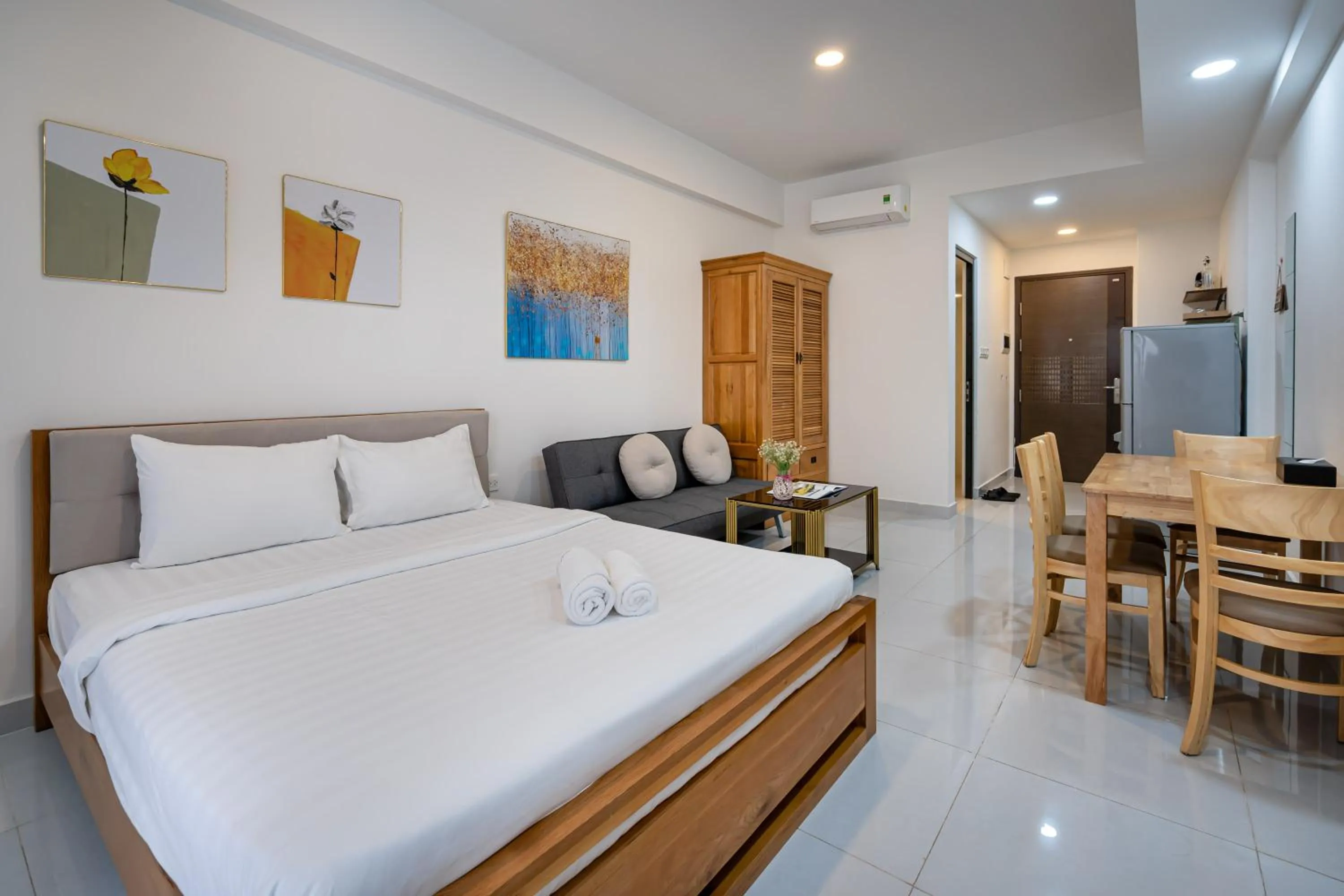 Bed in Otis Soho Saigon Balcony Apartment