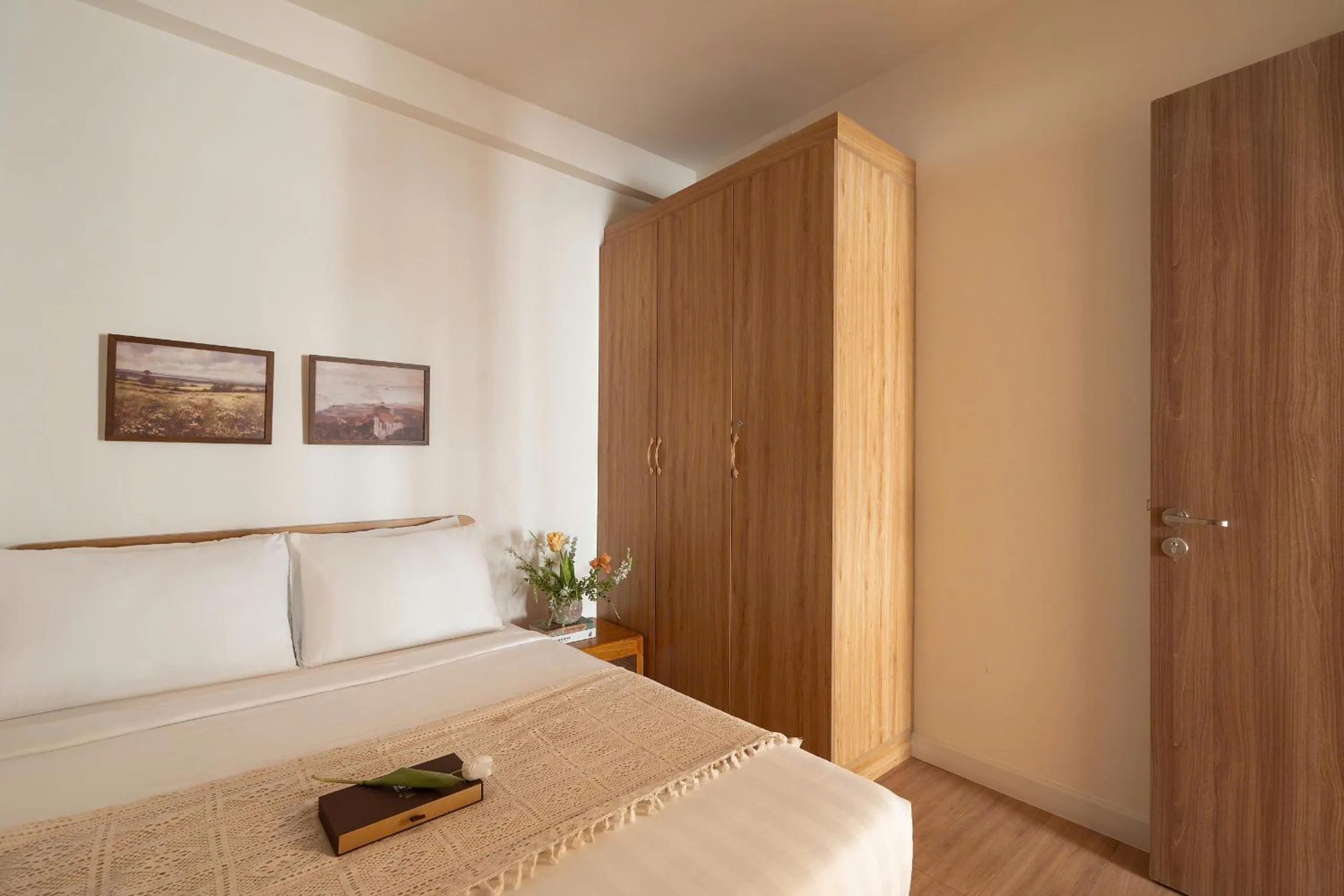 Bed in Otis Soho Saigon Balcony Apartment