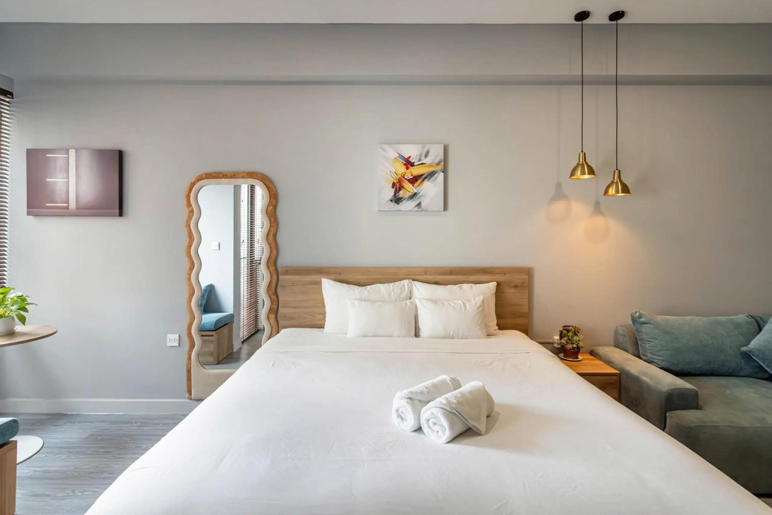 Bed in Otis Soho Saigon Balcony Apartment