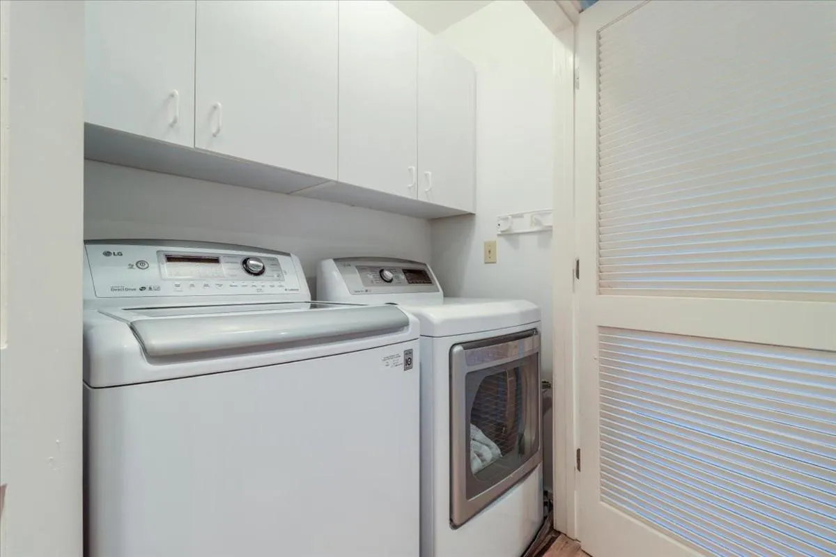 washing machine in Beach Club Villa 30 - Coastal Oceanfront! Pool! Walkout!