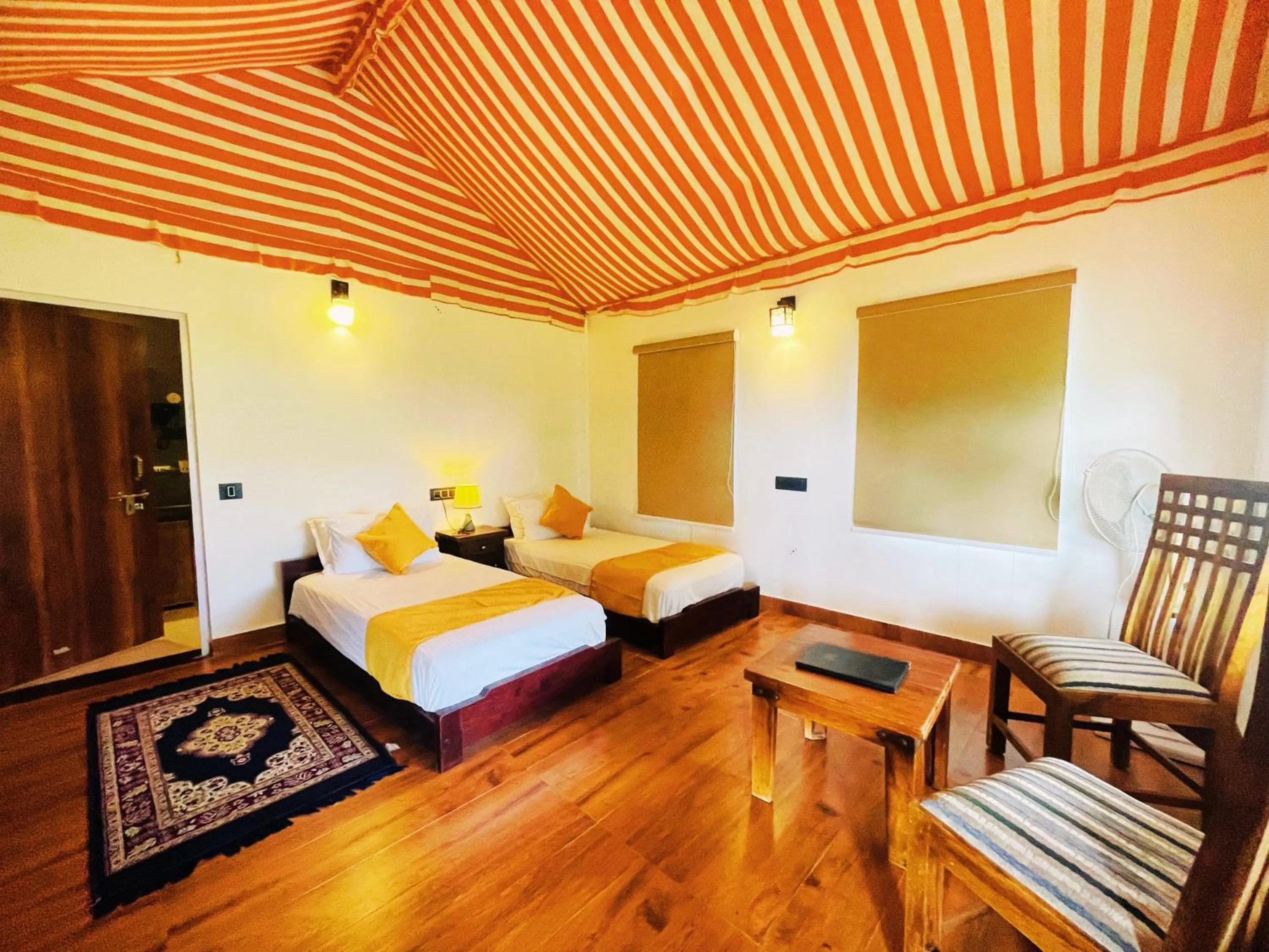 Living room, Bed in Cattle Inn Resort - Luxury Cottages Pushkar
