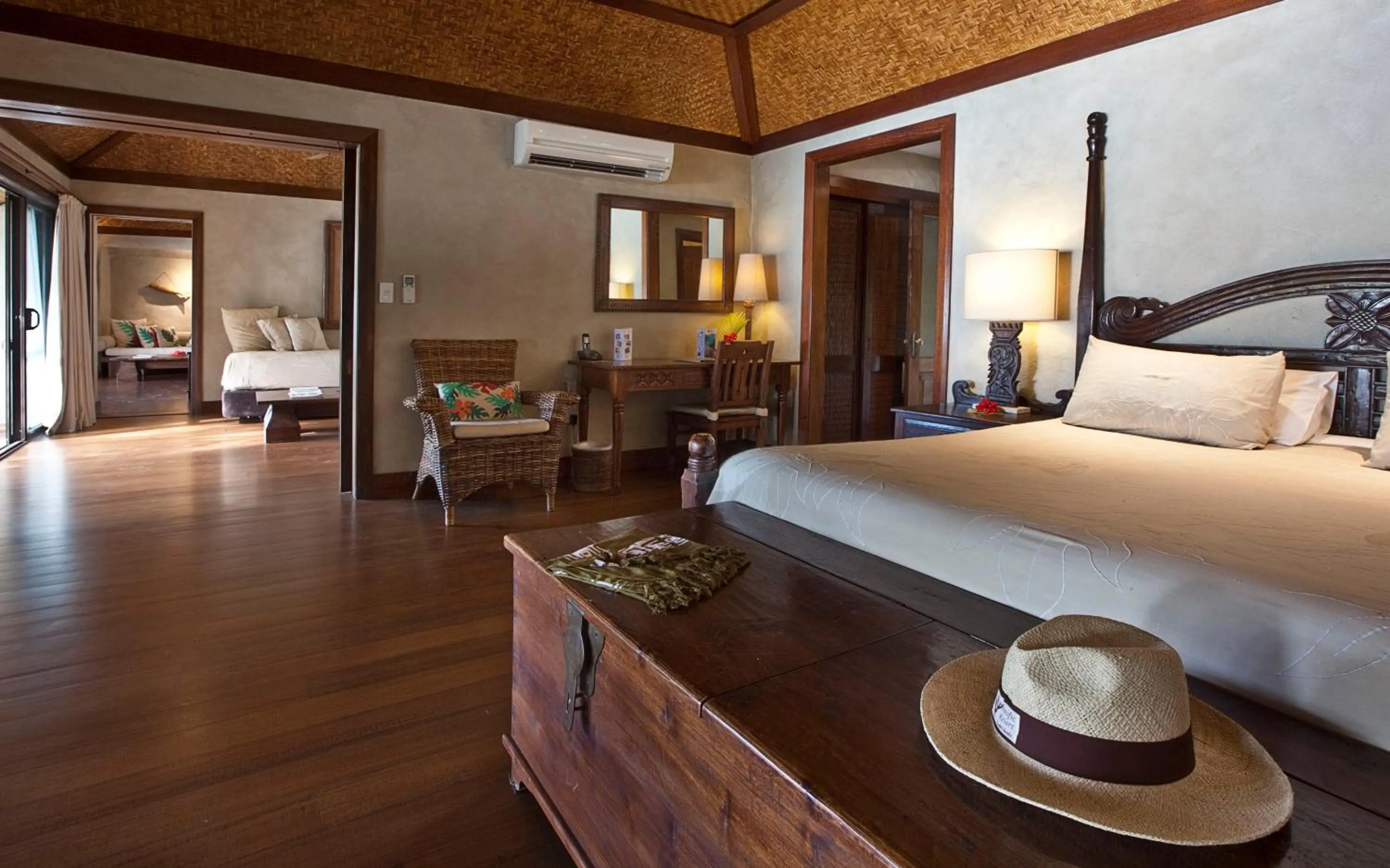 Photo of the whole room, Bed in Pacific Resort Aitutaki - Adults Only