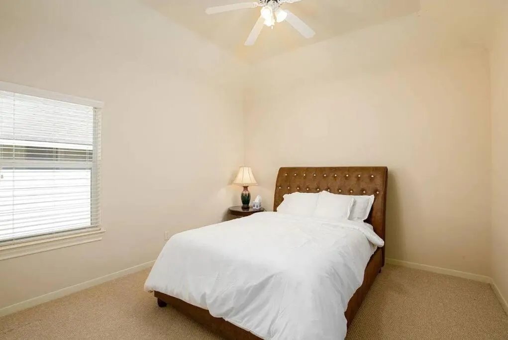 Bed in Bedroom with 3.5-Bathroom near Golf Course!