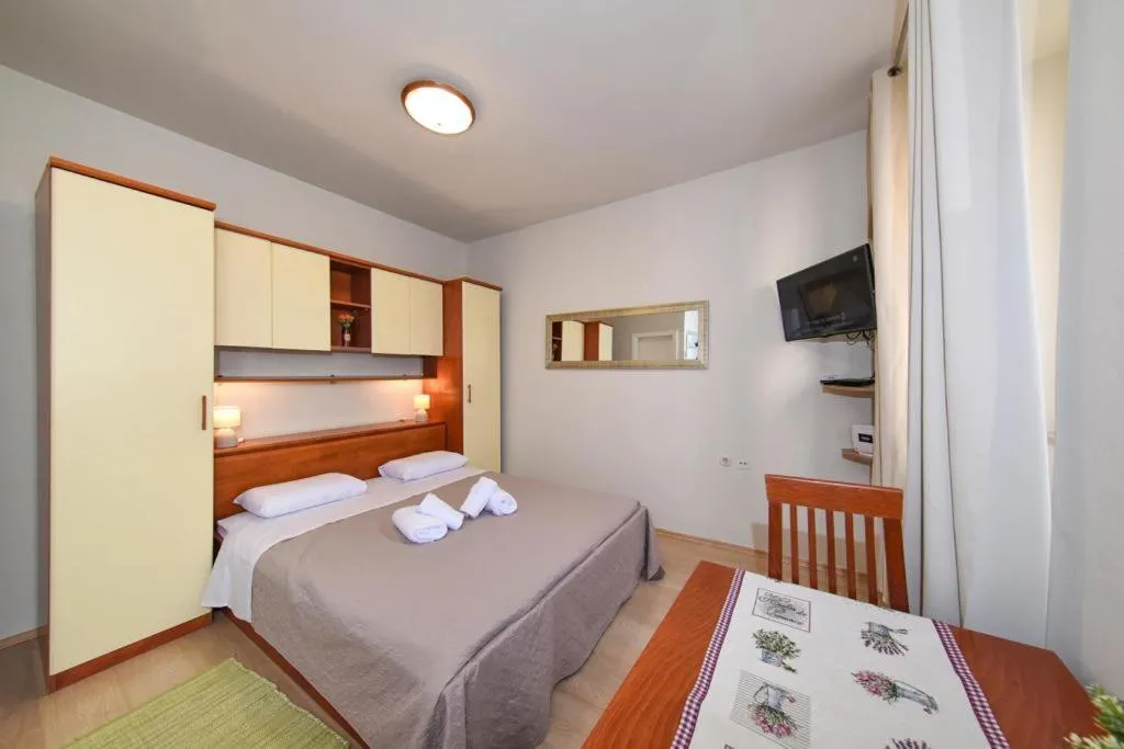 Bed in Apartment Zaratino