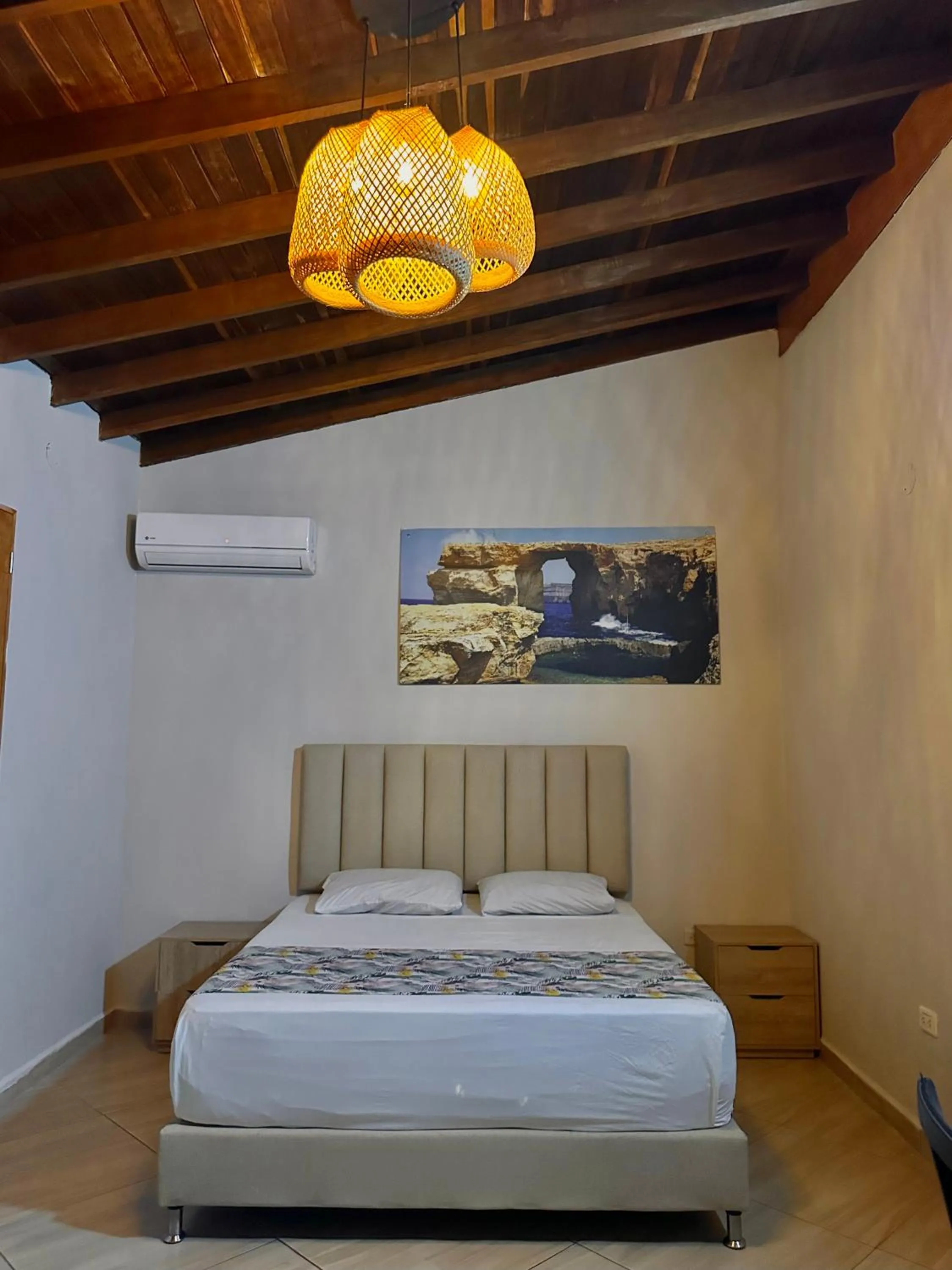 Bed in HOTEL BALI AT POBLADO