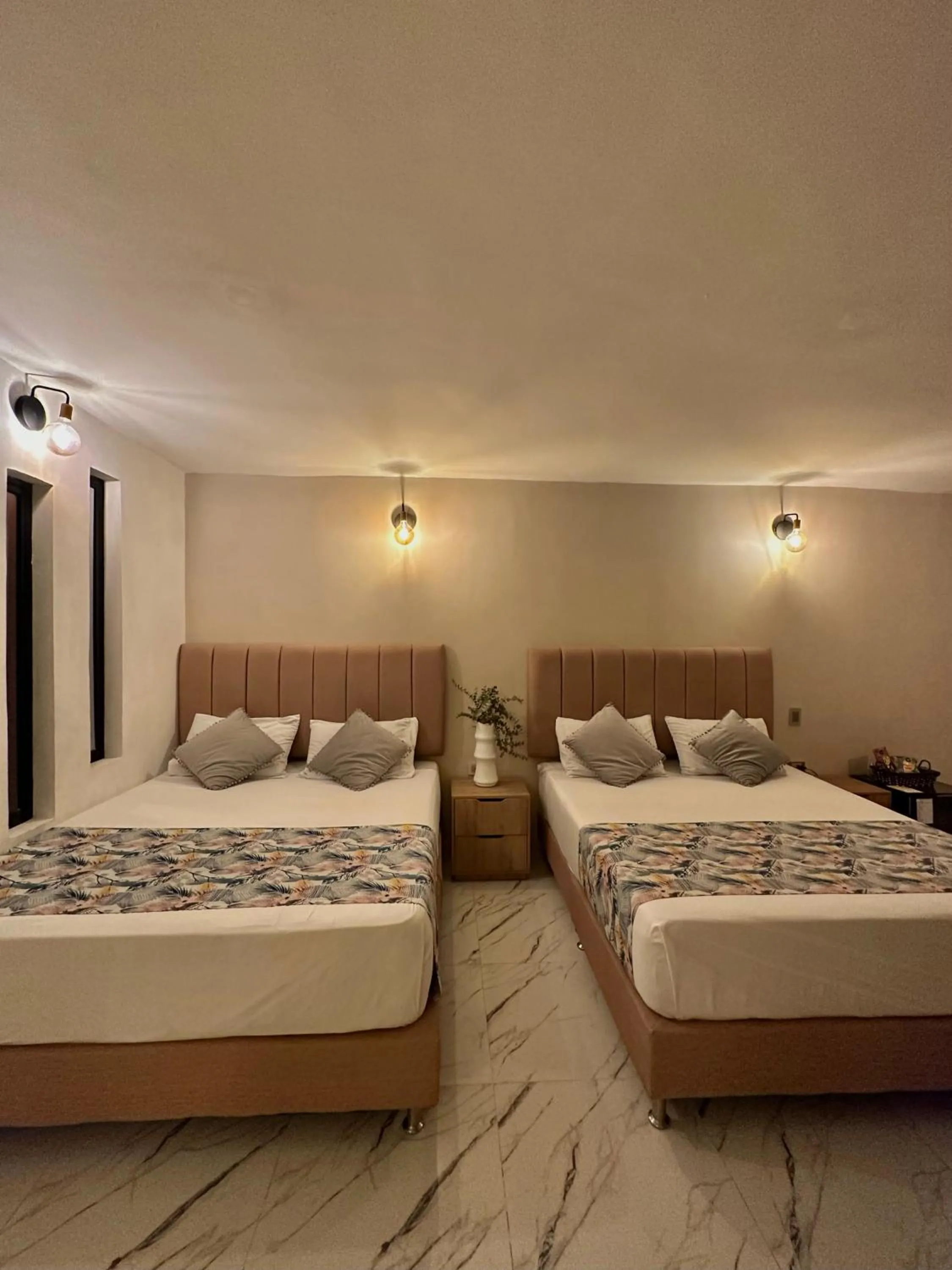 Bed in HOTEL BALI AT POBLADO