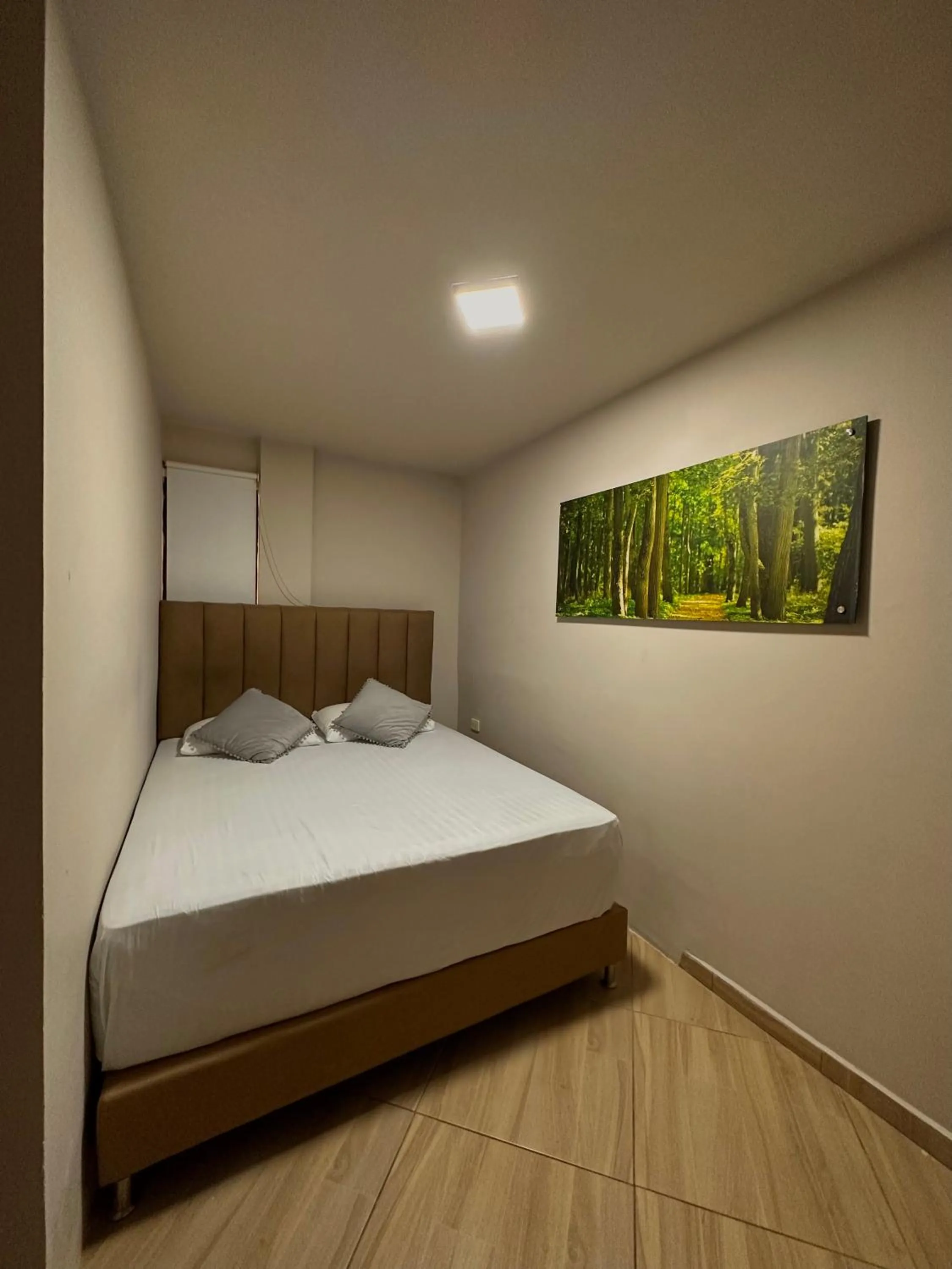 Bed in HOTEL BALI AT POBLADO