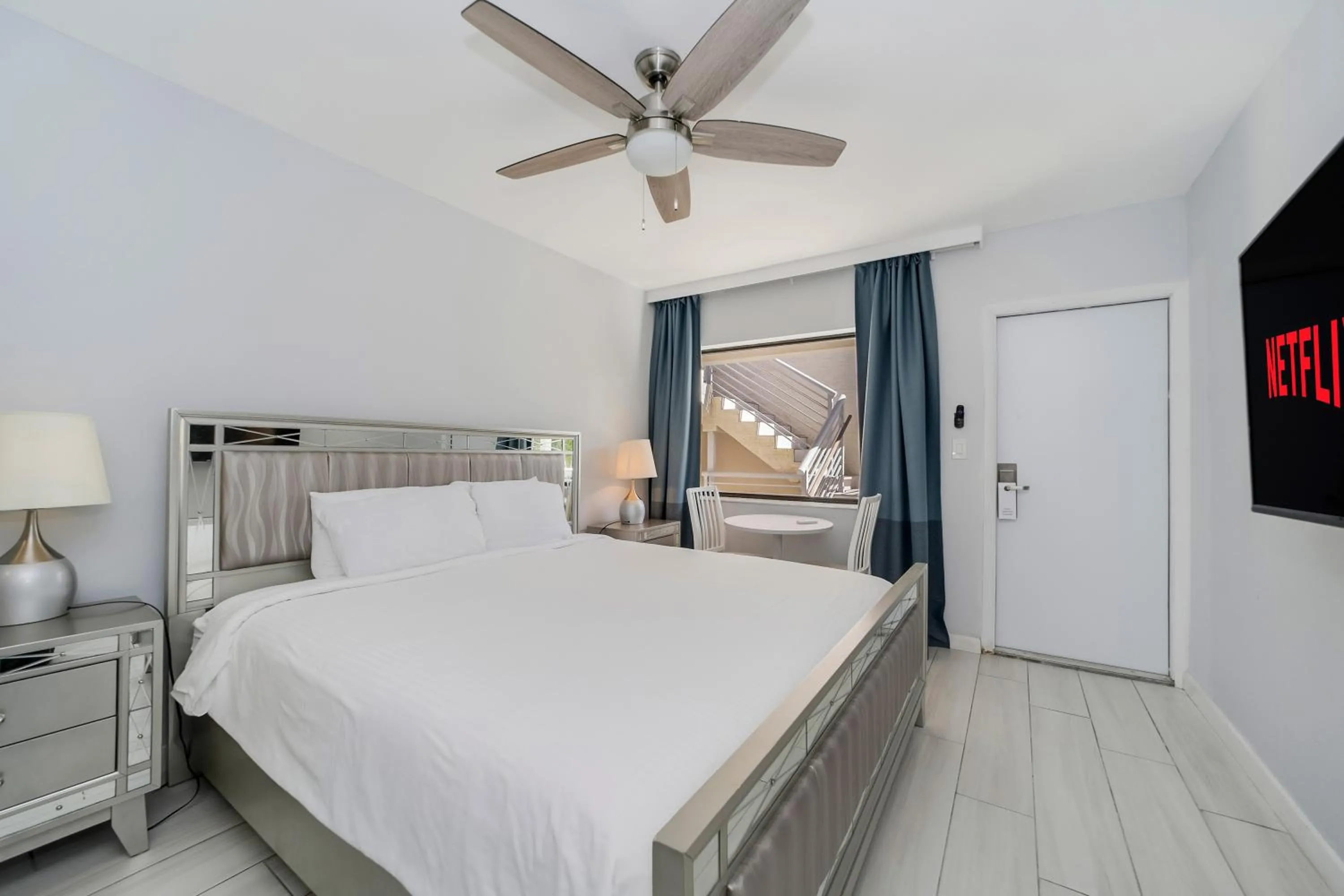 Communal lounge/ TV room, Bed in Deco Boutique Hotel