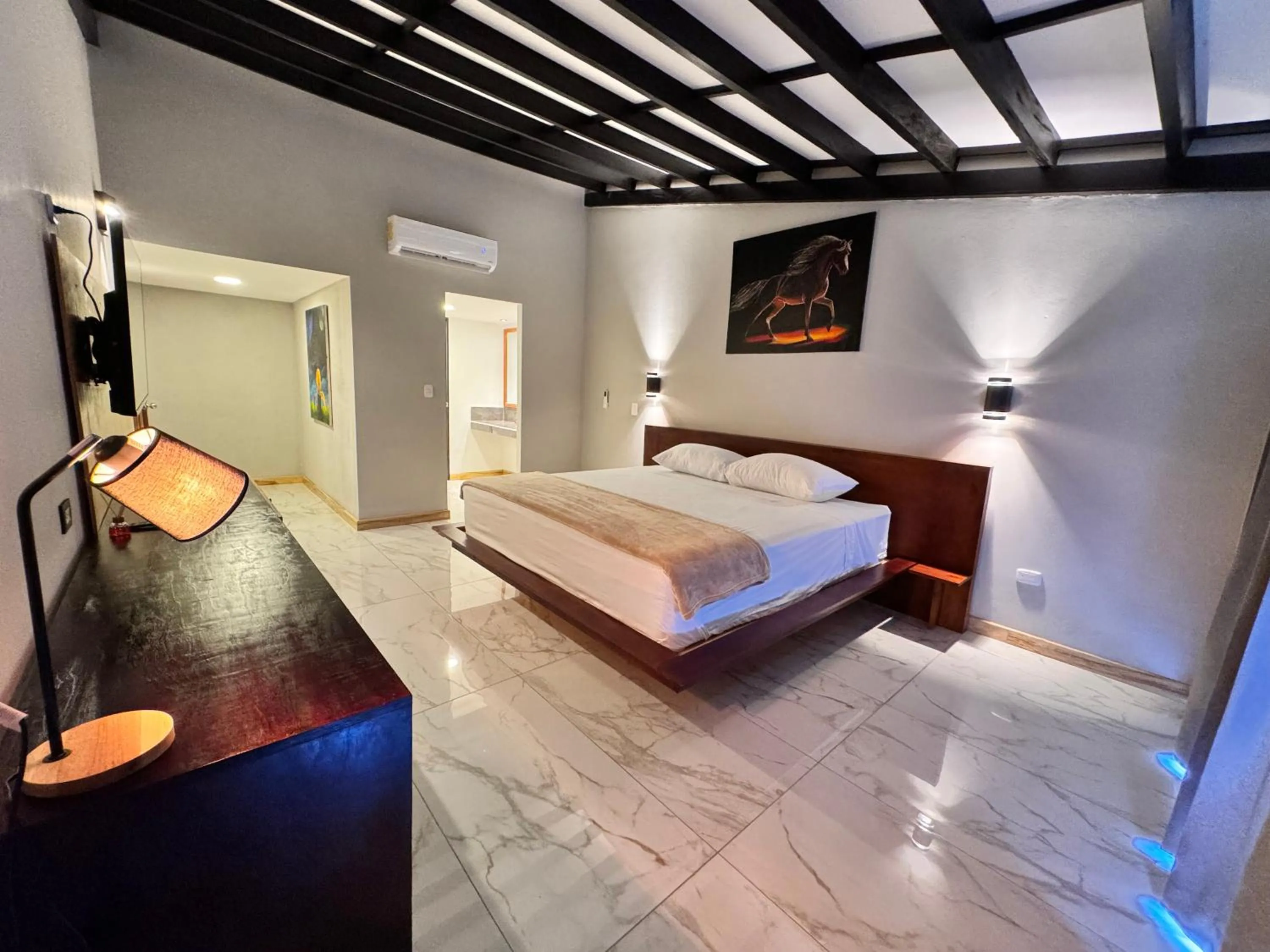 Bed in HOTEL TESORO BEACH