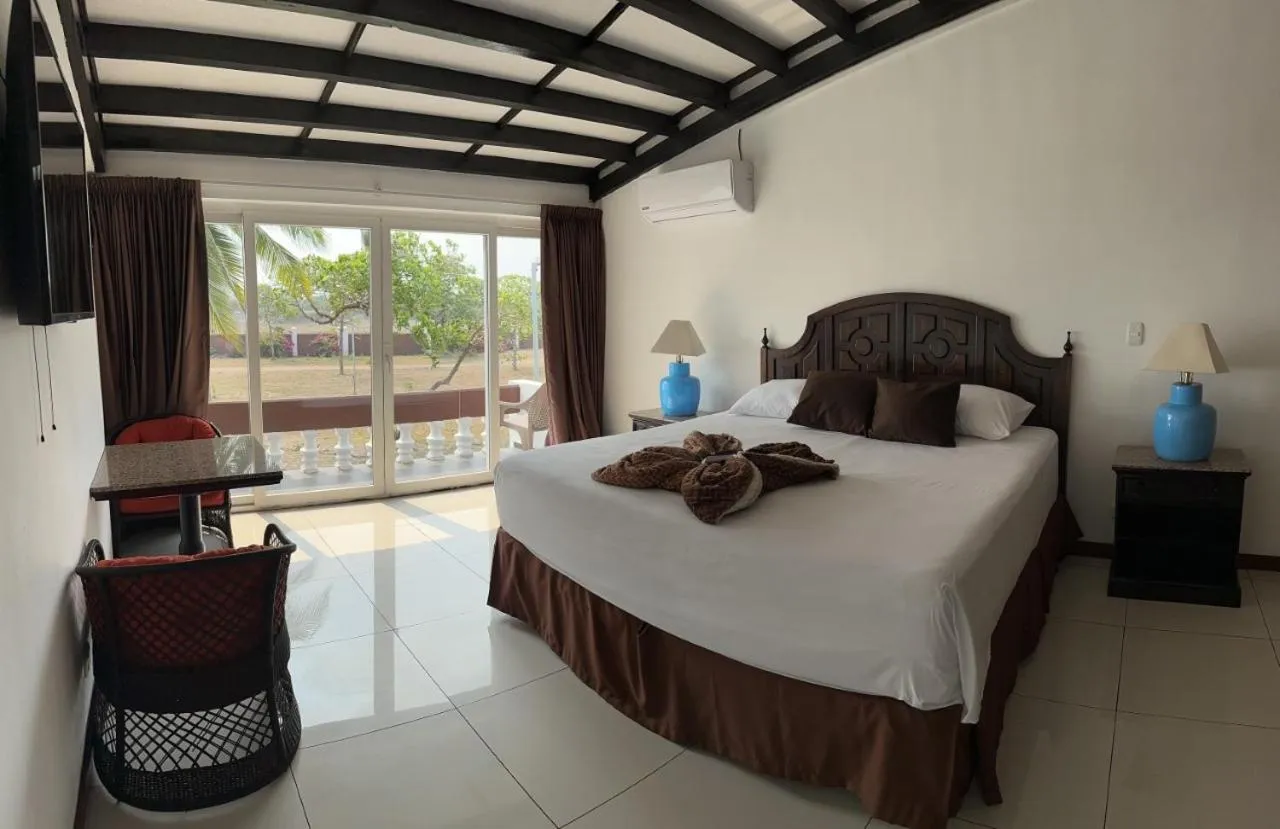 Bed in HOTEL TESORO BEACH