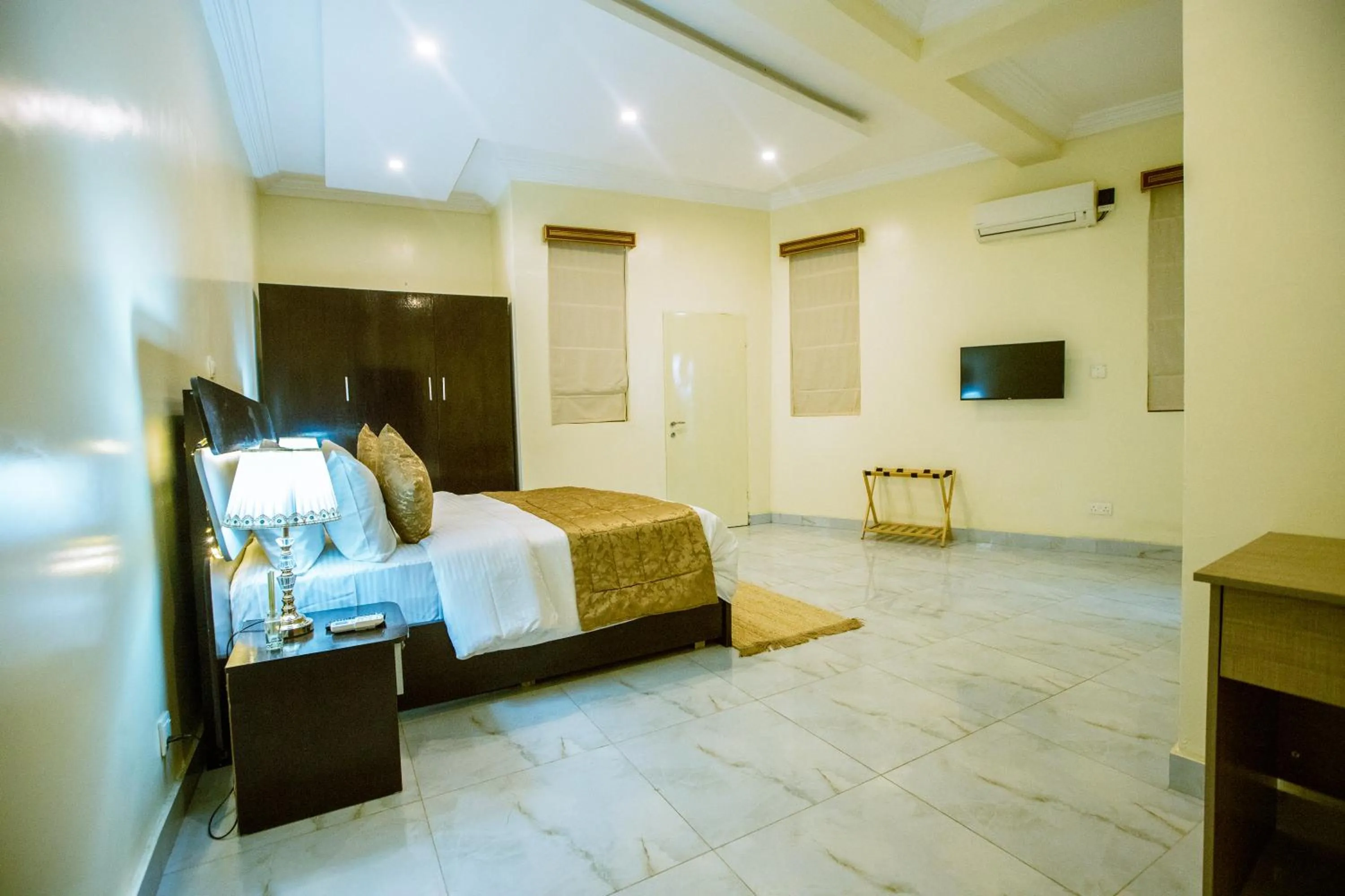 Bed in Providha Hotel & Suites