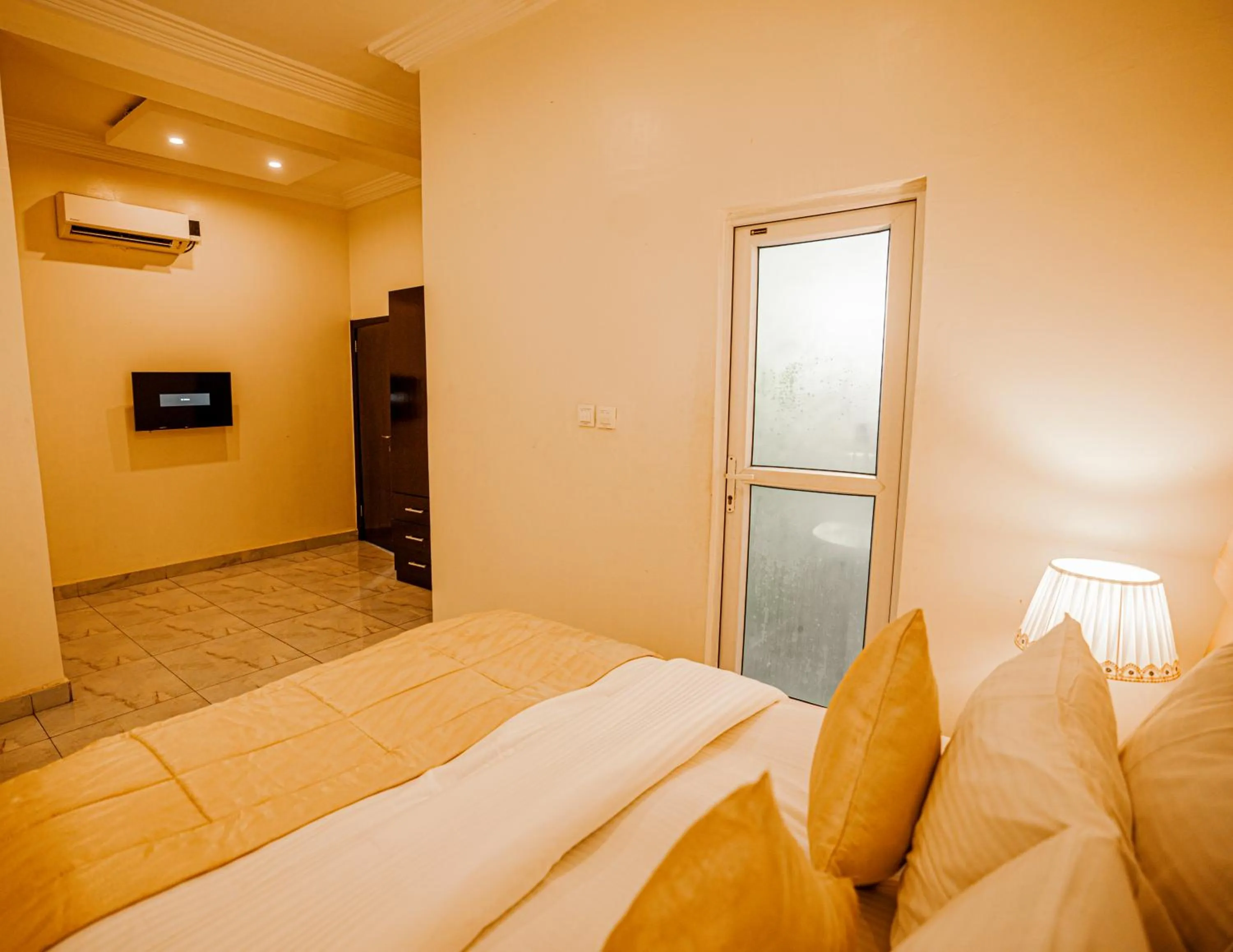 Bed in Providha Hotel & Suites