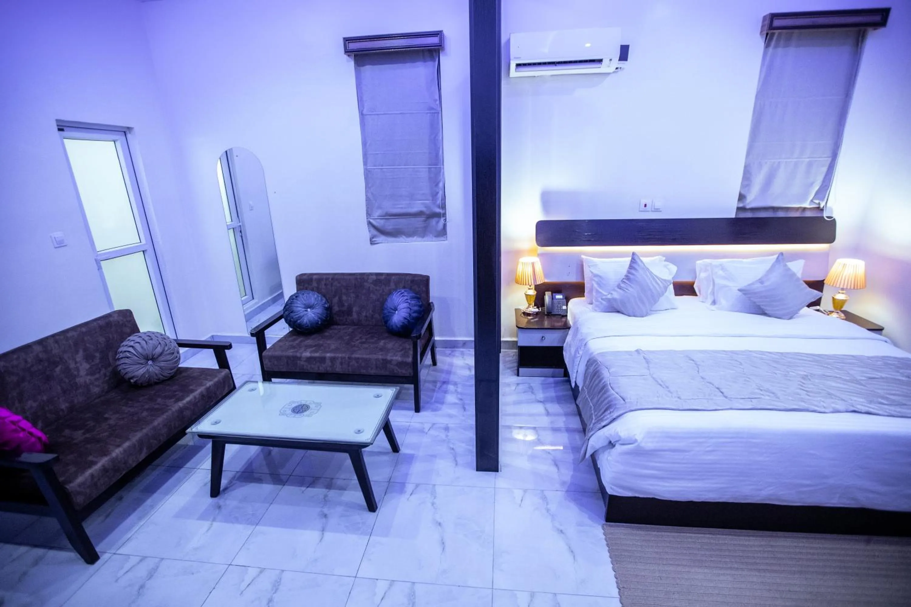 Bed in Providha Hotel & Suites