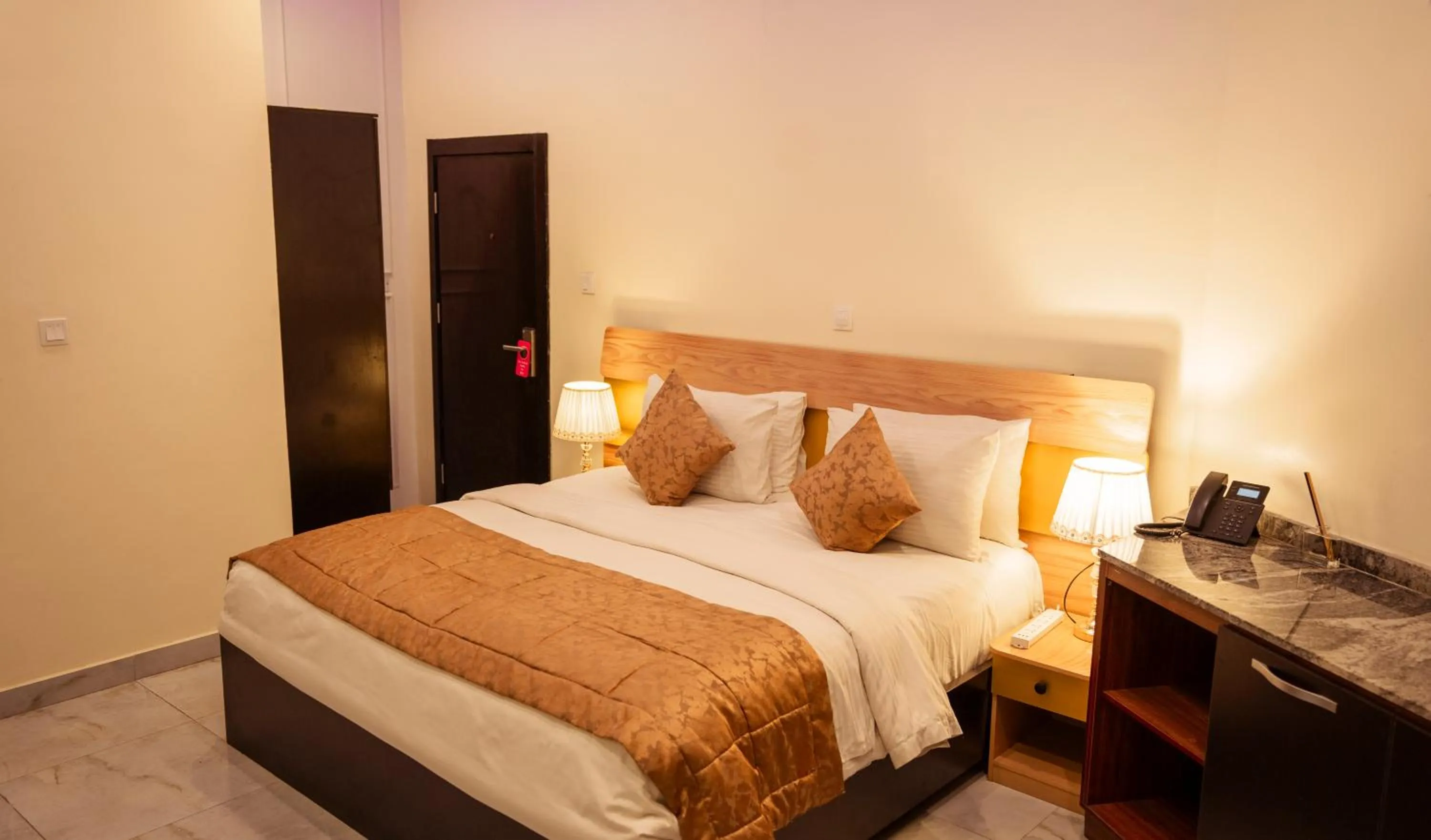 Bed in Providha Hotel & Suites
