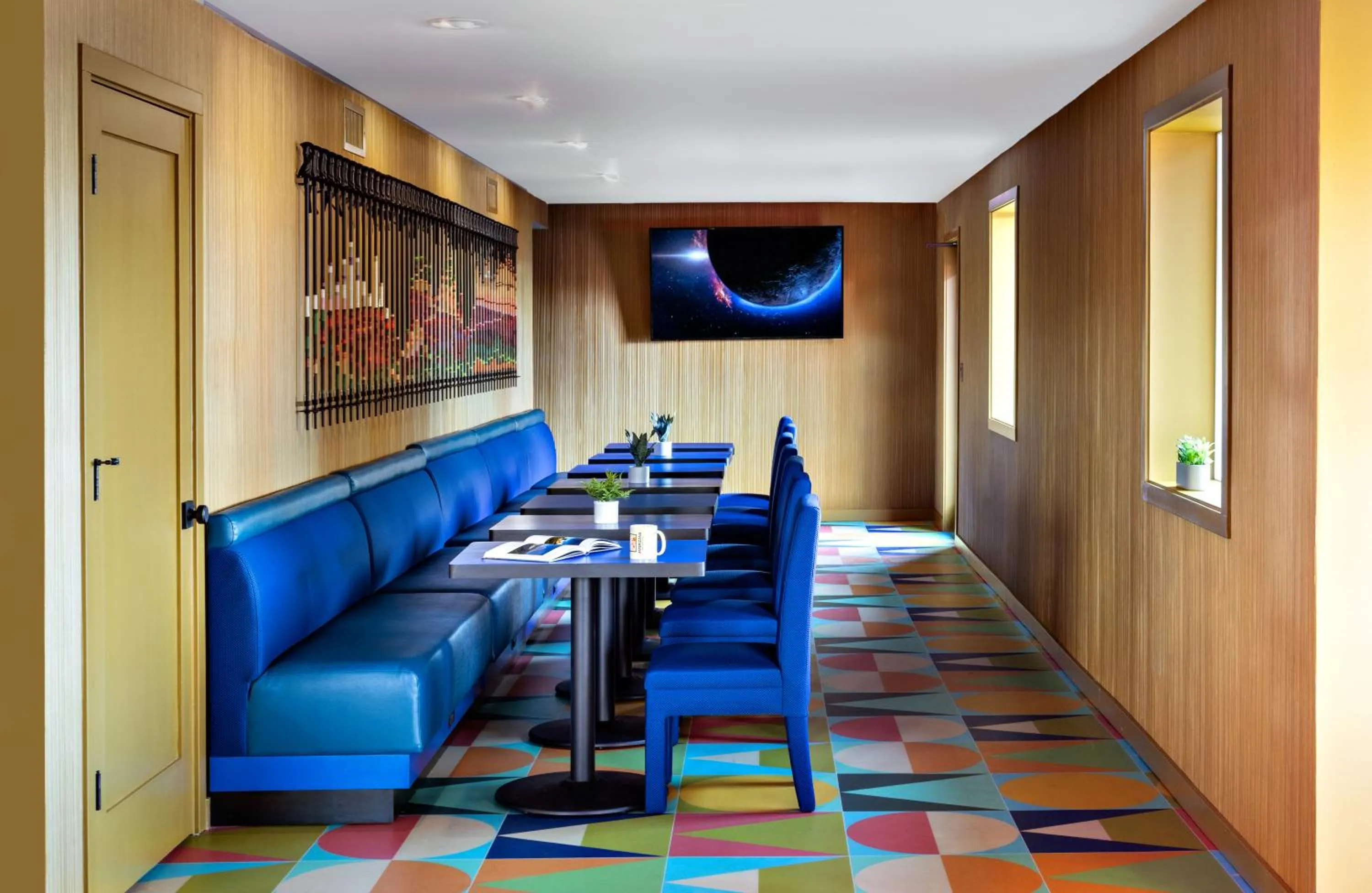 Seating area in Americana Motor Hotel