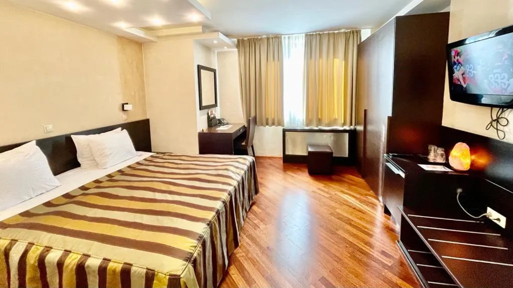 Bed in City Boutique Hotel