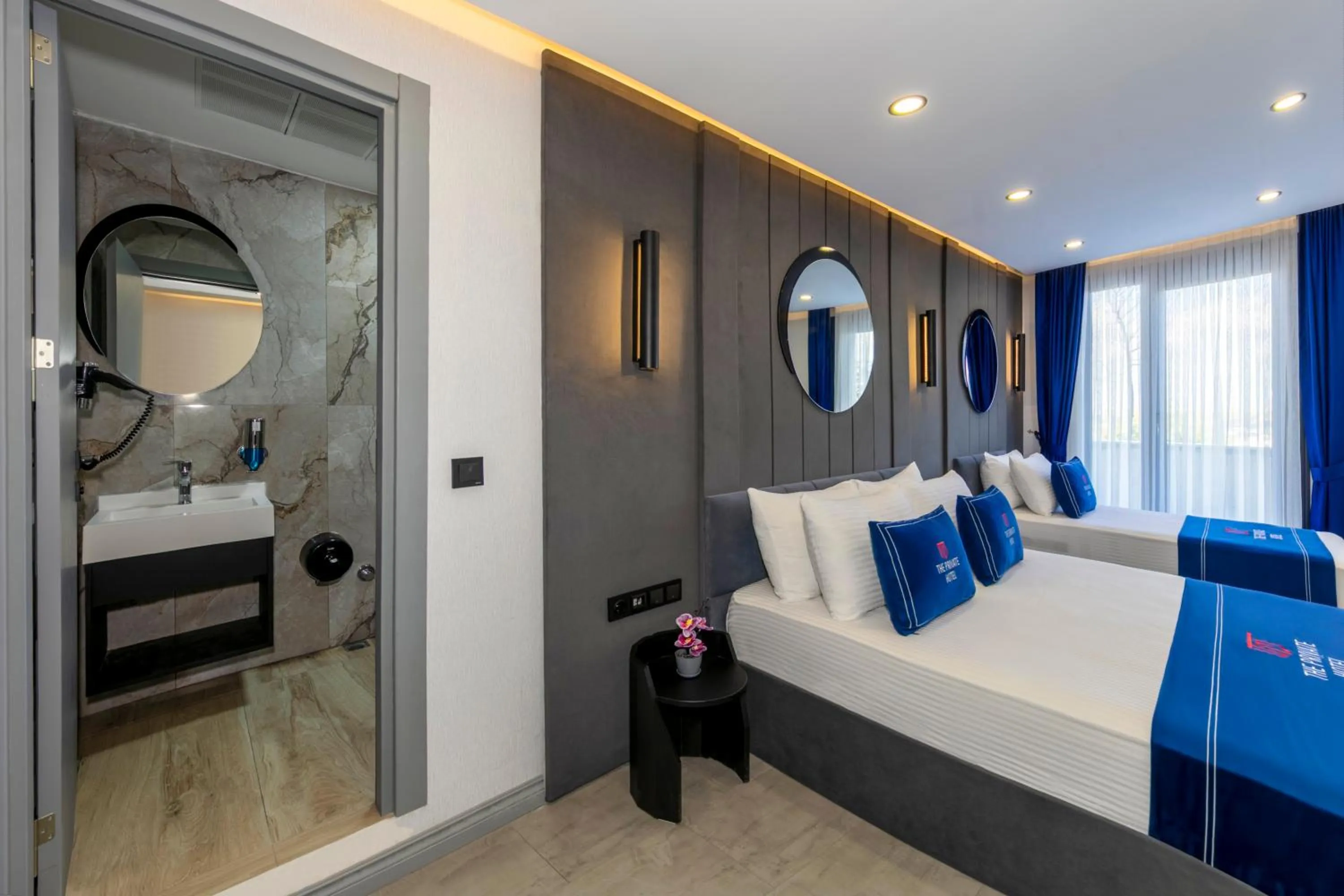 Bathroom, Bed in The Private Airport Hotel