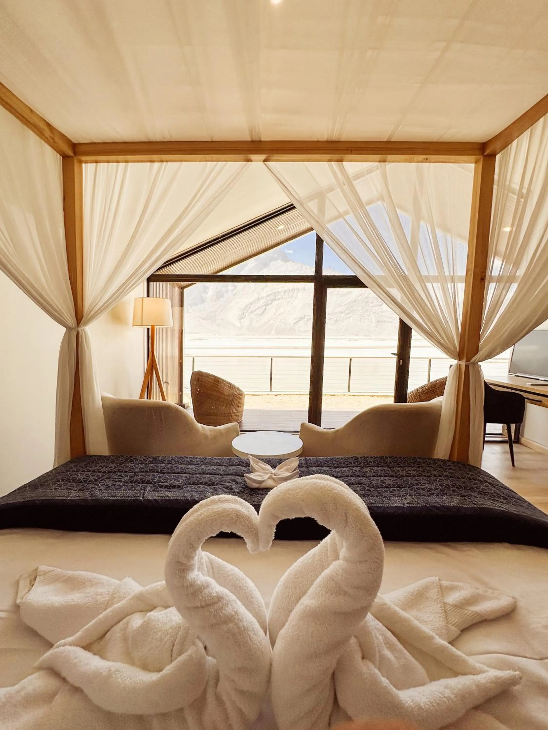 Seating area, Bed in Khoj Resorts Shigar