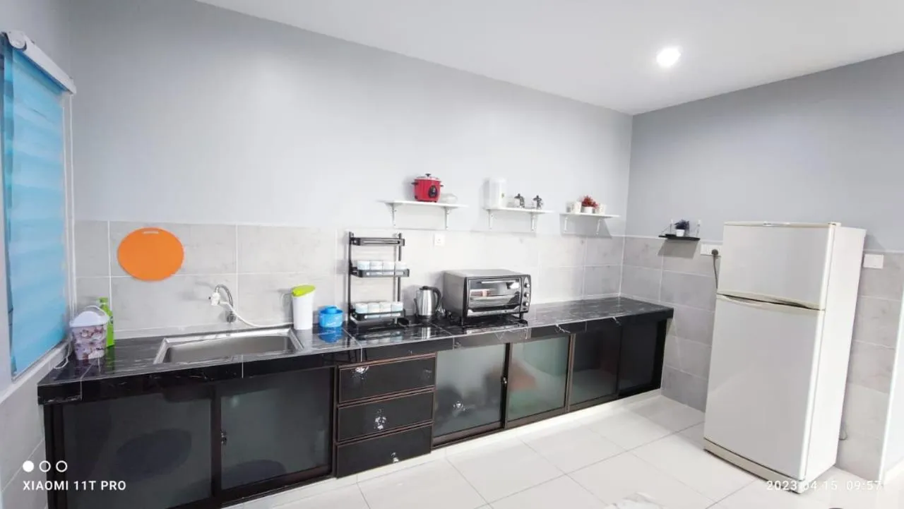 Kitchen or kitchenette in kakao homestay ipoh town 2parking 3room 10pax wifi