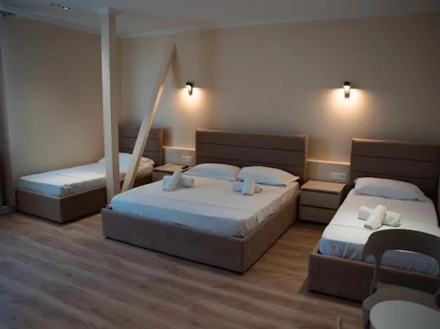 Bed in OKEJ Hotel
