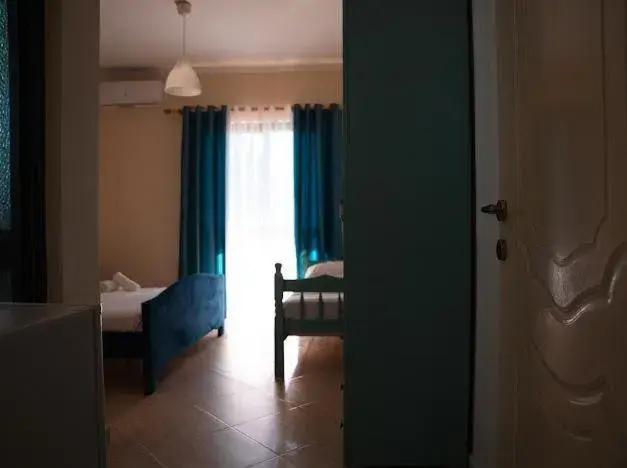 Triple Room with Balcony in OKEJ Hotel Triple Room with Balcony in OKEJ Hotel