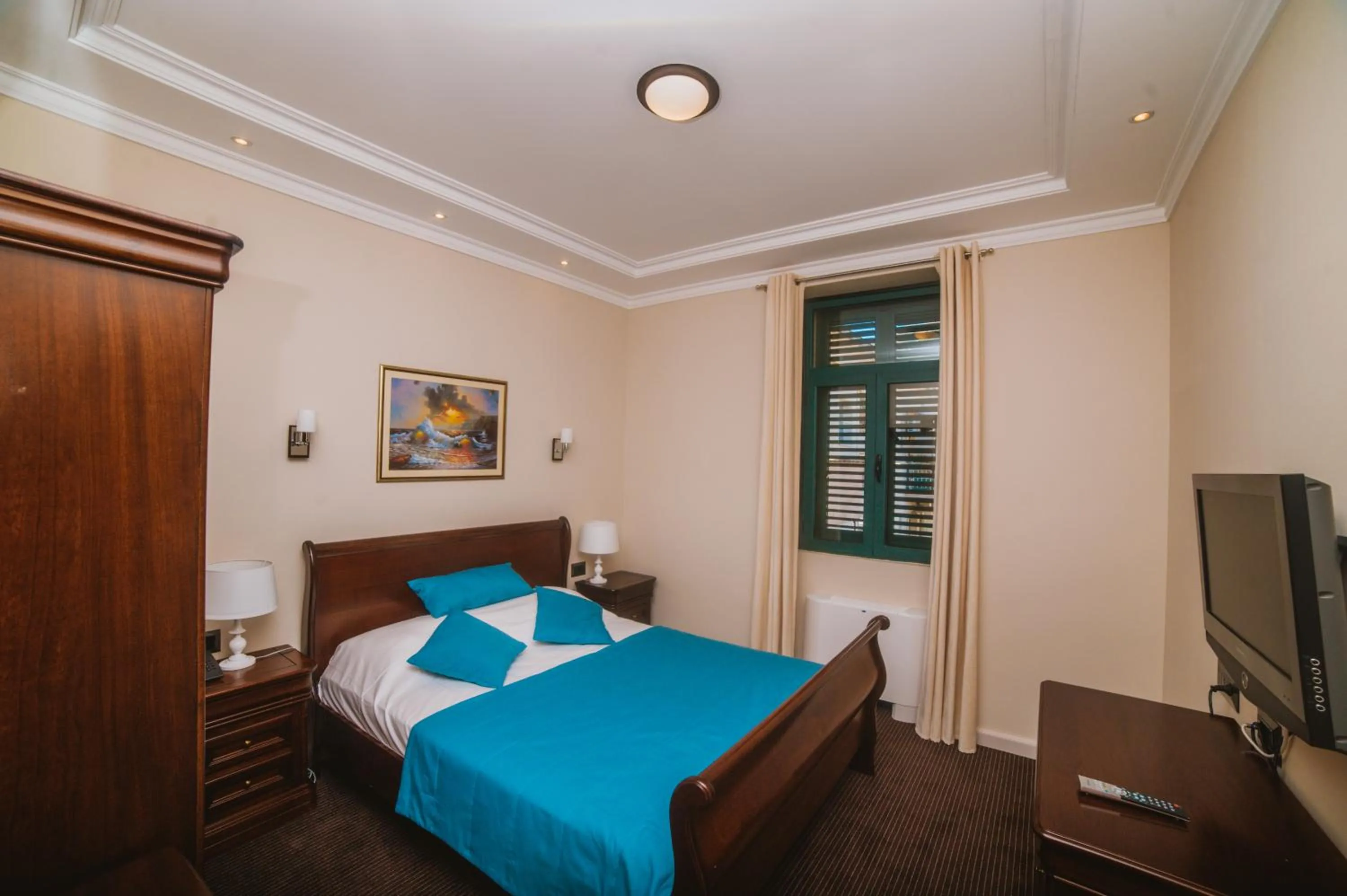 Bed in Hotel Astoria