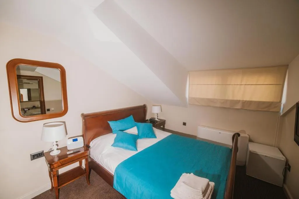 Bed in Hotel Astoria