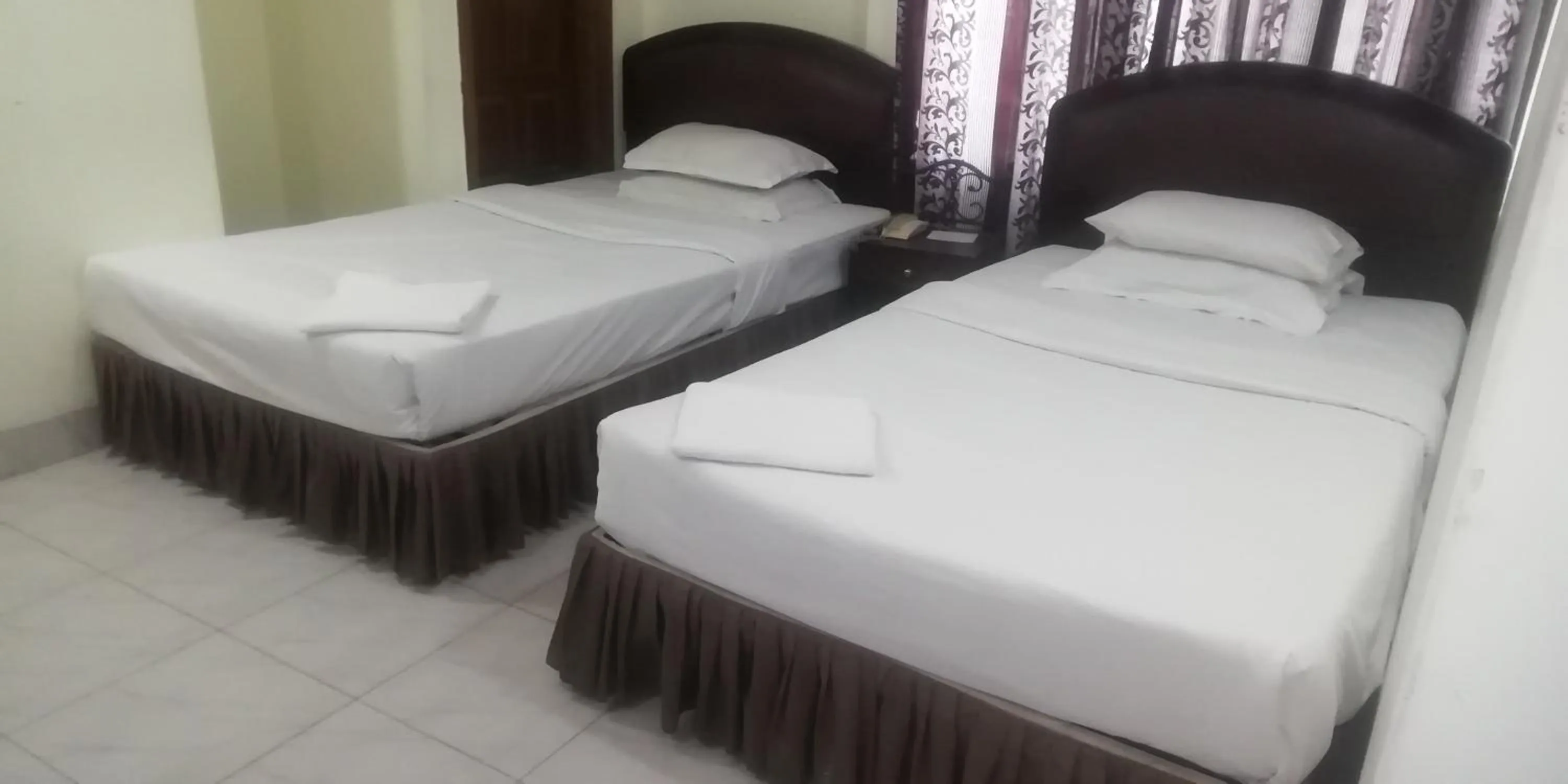 Bed in Hotel Skylink