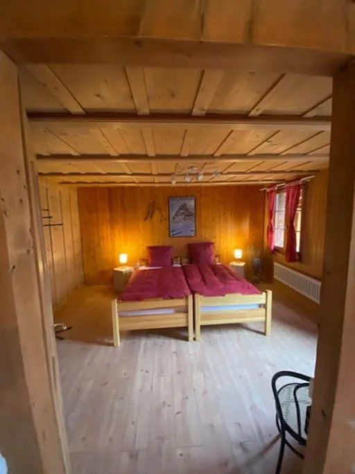Bed in Wohnen mit Blick auf Eiger - ehemaliges Bauernhaus - 2 Schlafzimmer