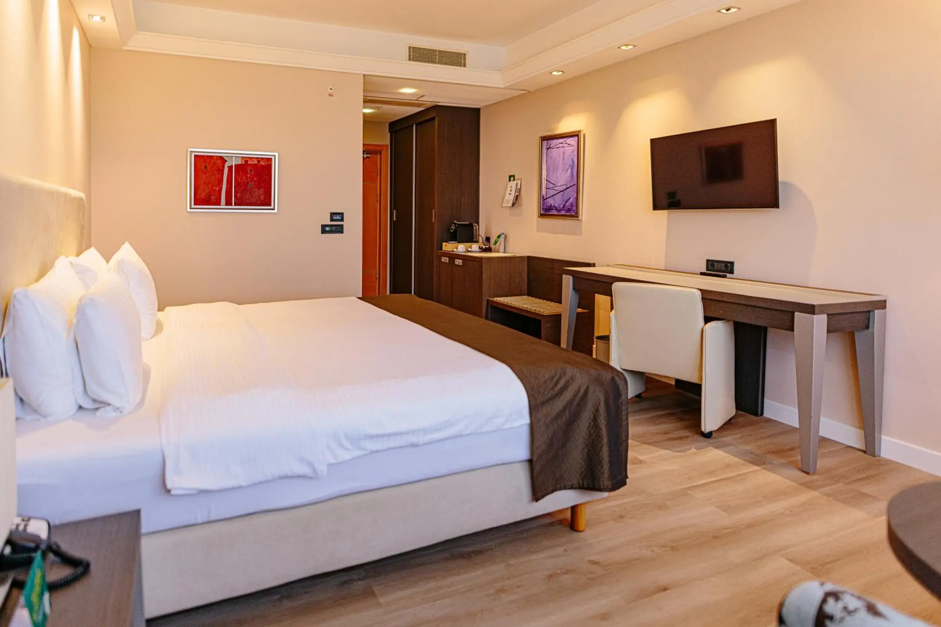 Bed in Holiday Inn Belgrade, an IHG Hotel Bed in Holiday Inn Belgrade, an IHG Hotel