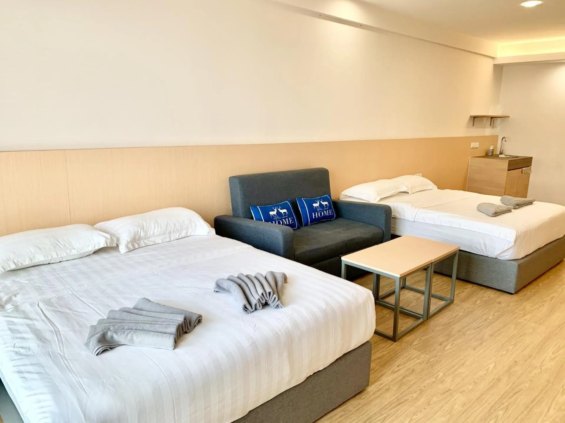 Living room, Bed in Deco Home @ Aru Suites