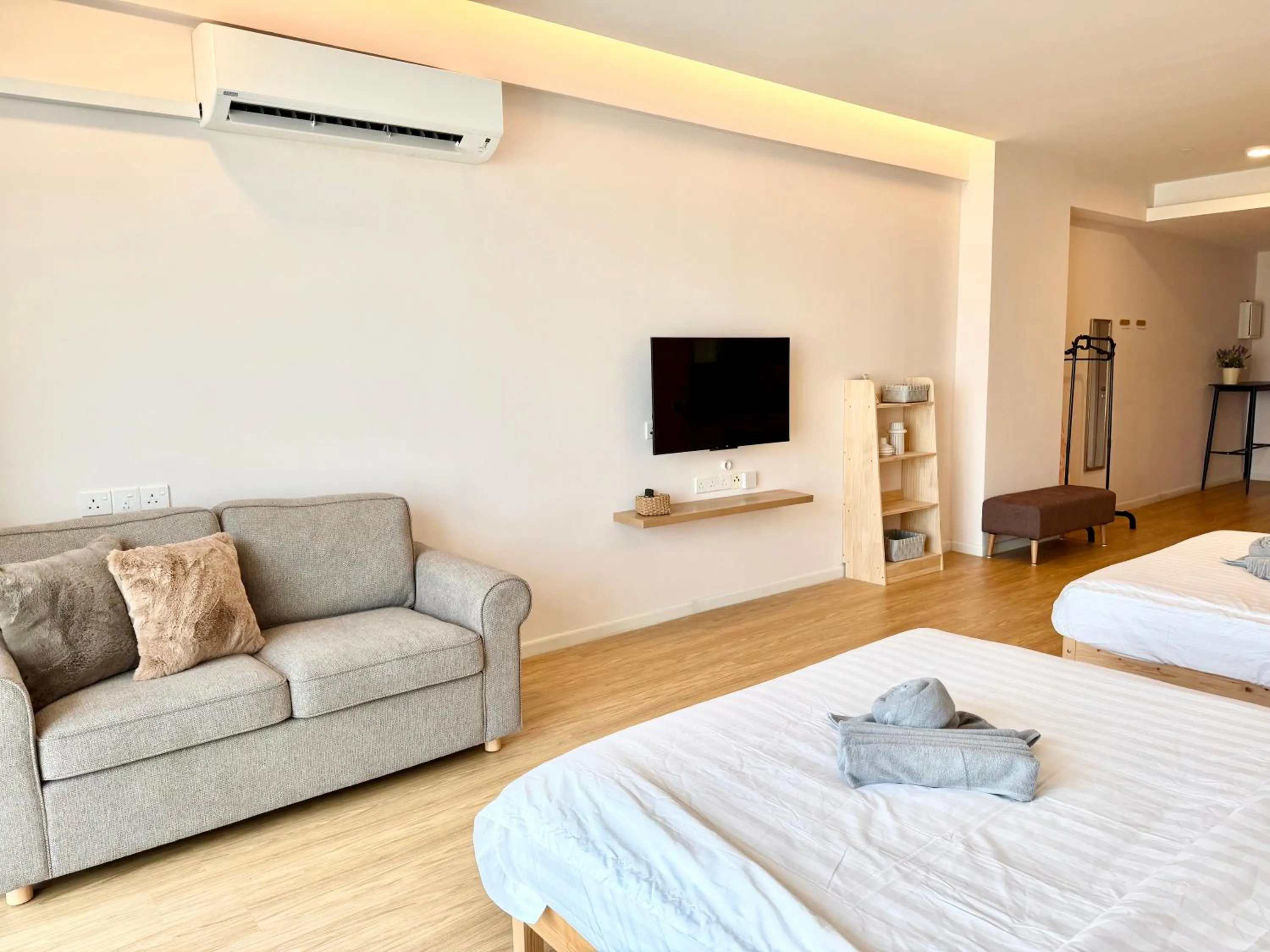 Living room, Bed in Deco Home @ Aru Suites