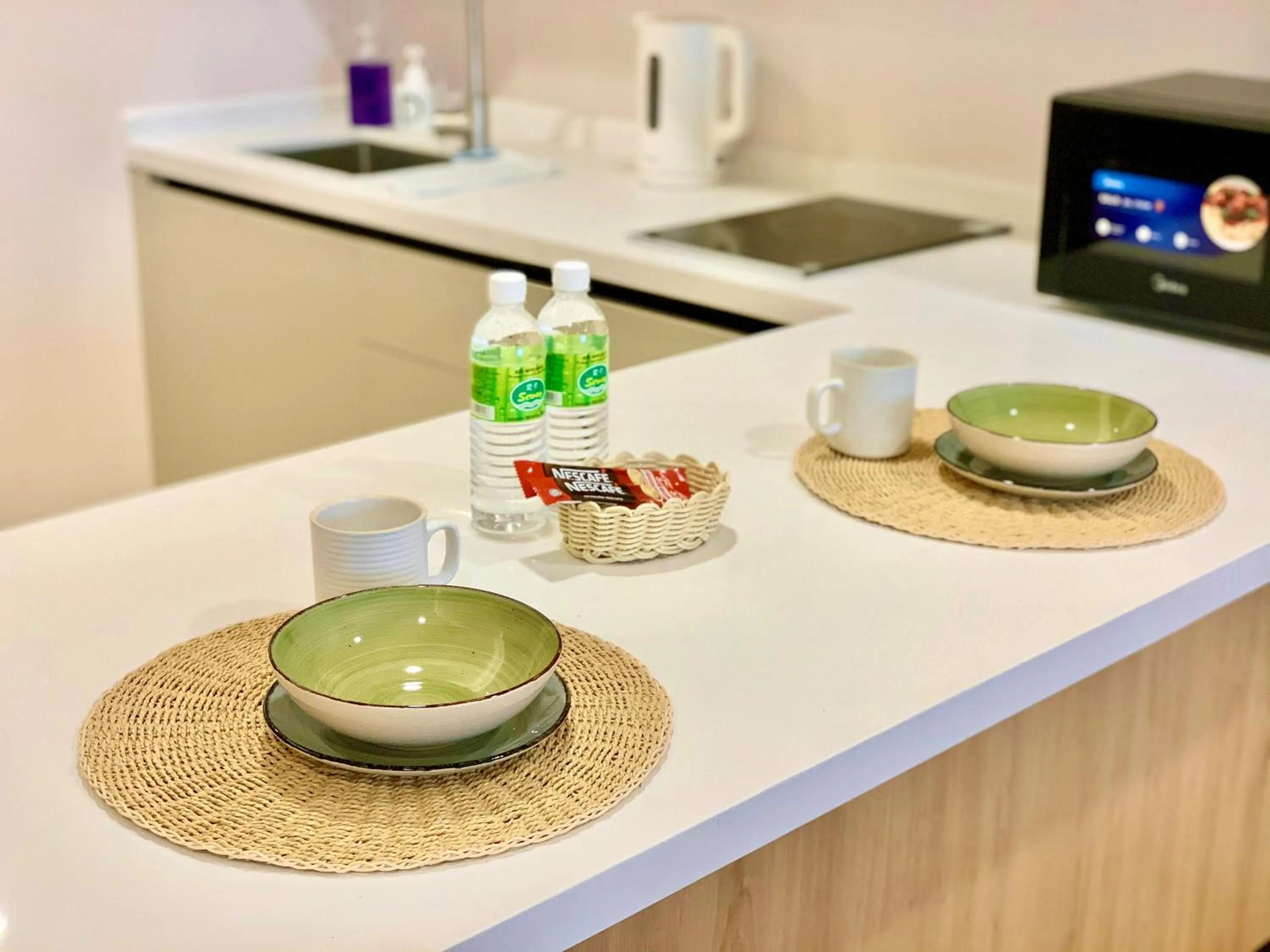 Kitchen or kitchenette in Deco Home @ Aru Suites