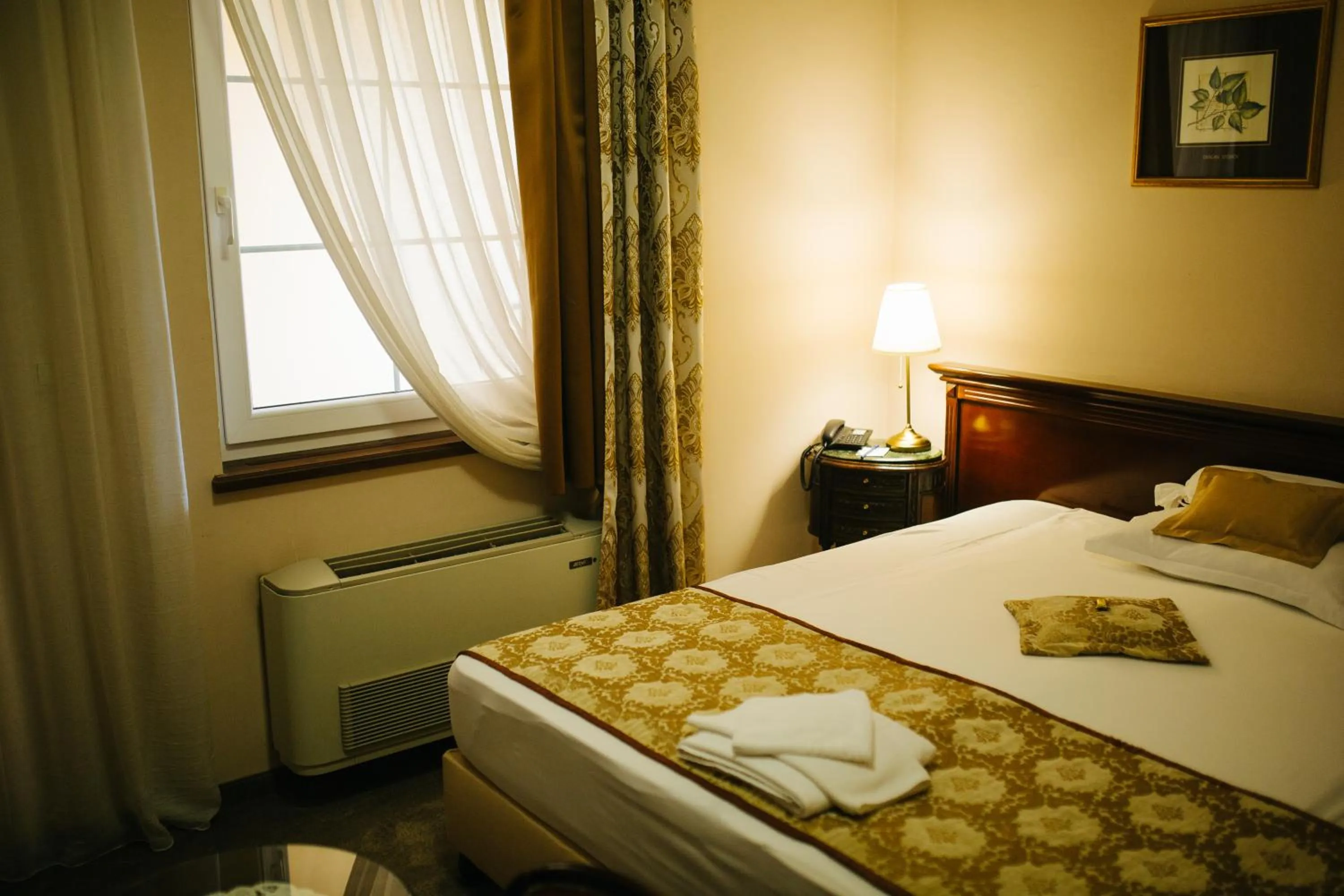 Bed in Garni Hotel Andric