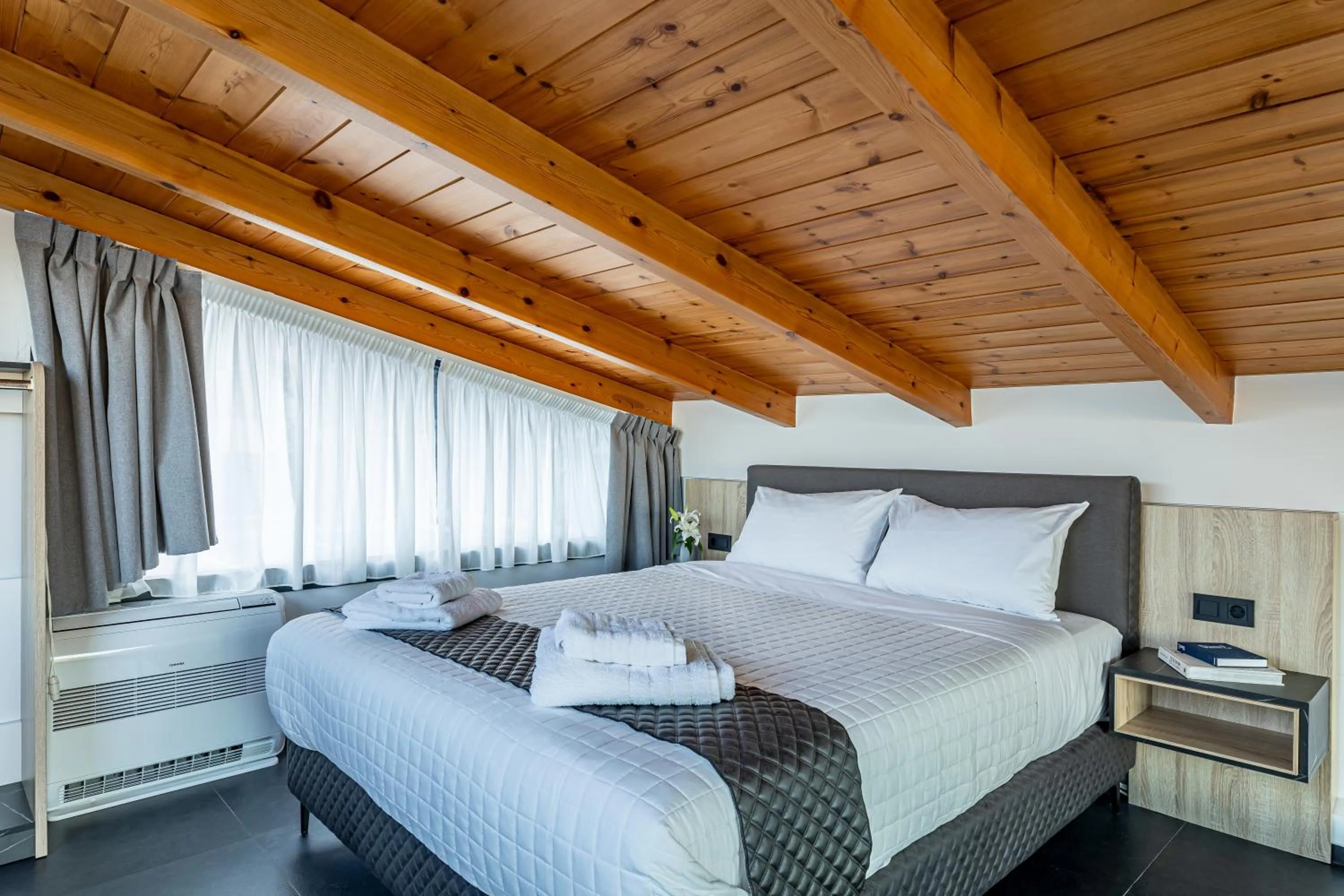 Bed in CITY HILL Luxury Apartments