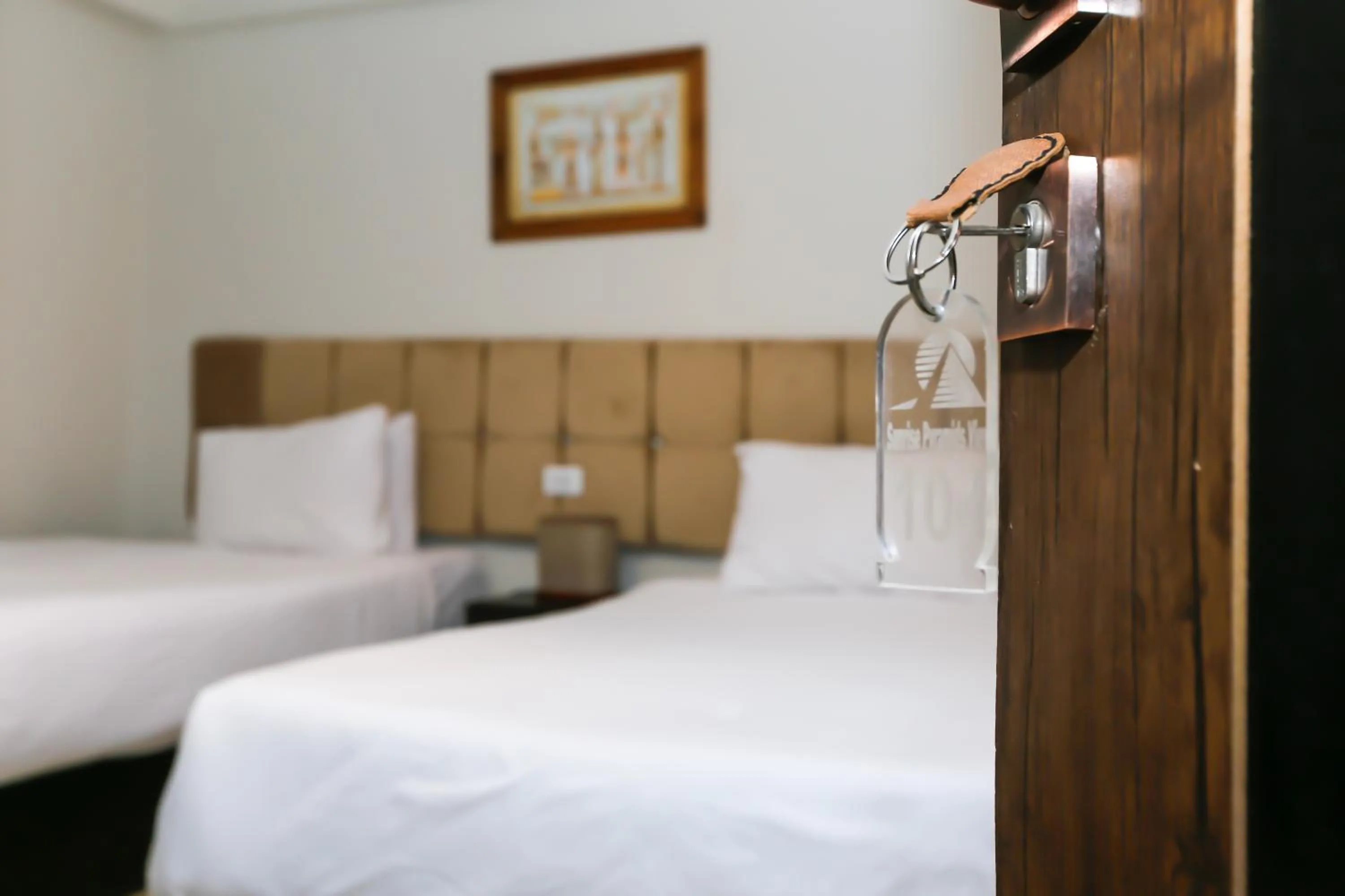 Bed in Crowne Pyramids View inn