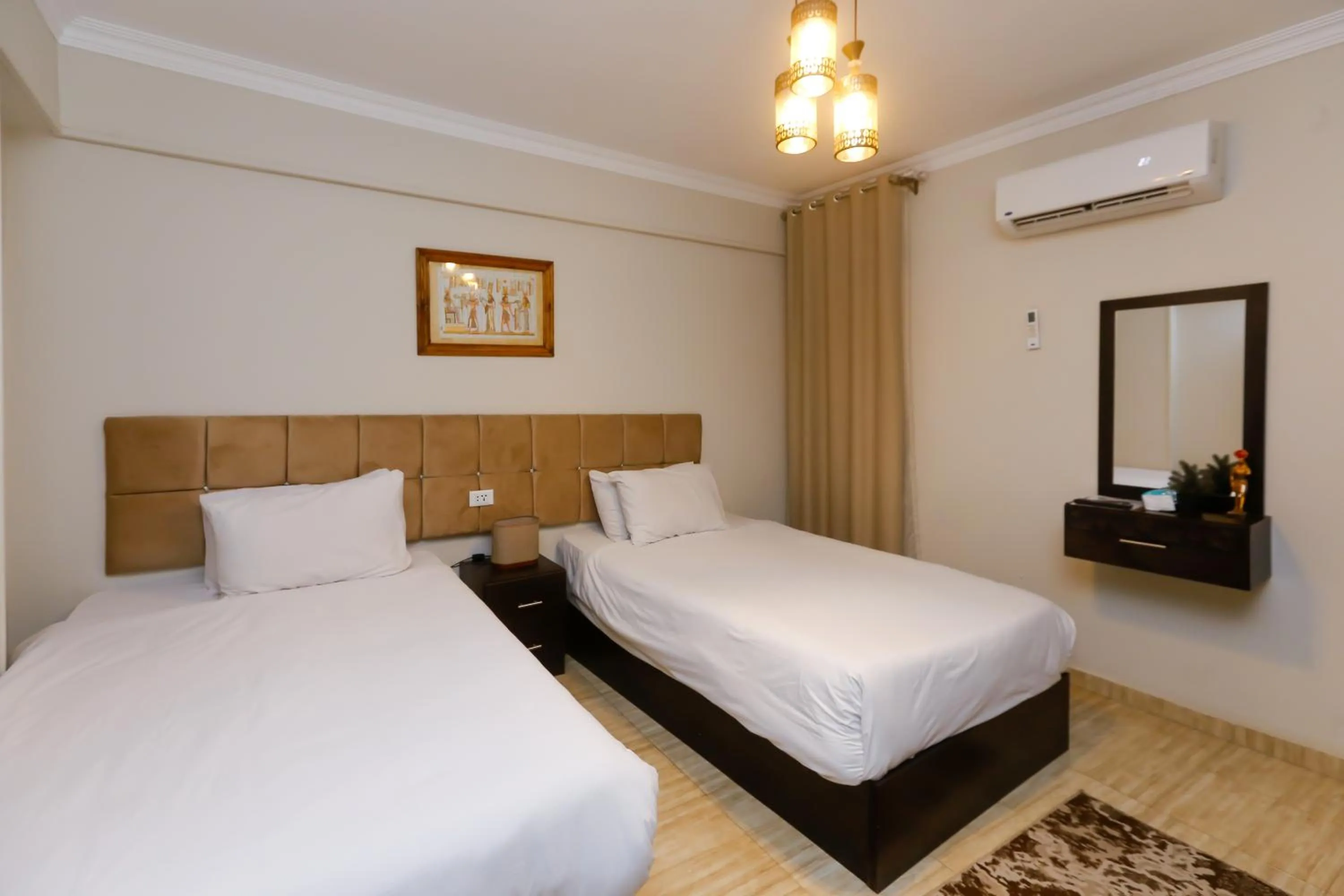 Bed in Crowne Pyramids View inn