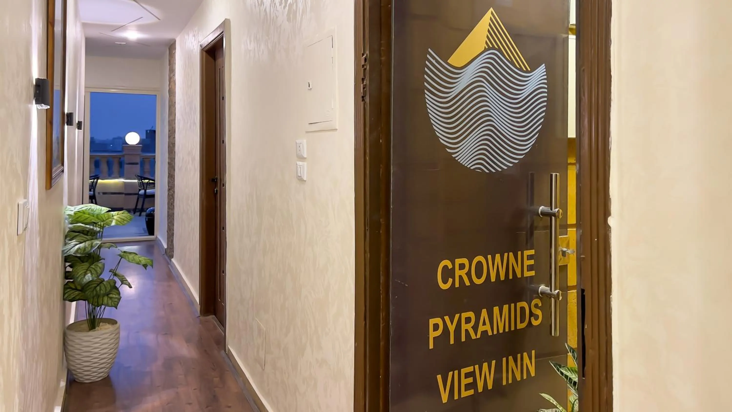 Property logo or sign in Crowne Pyramids View inn