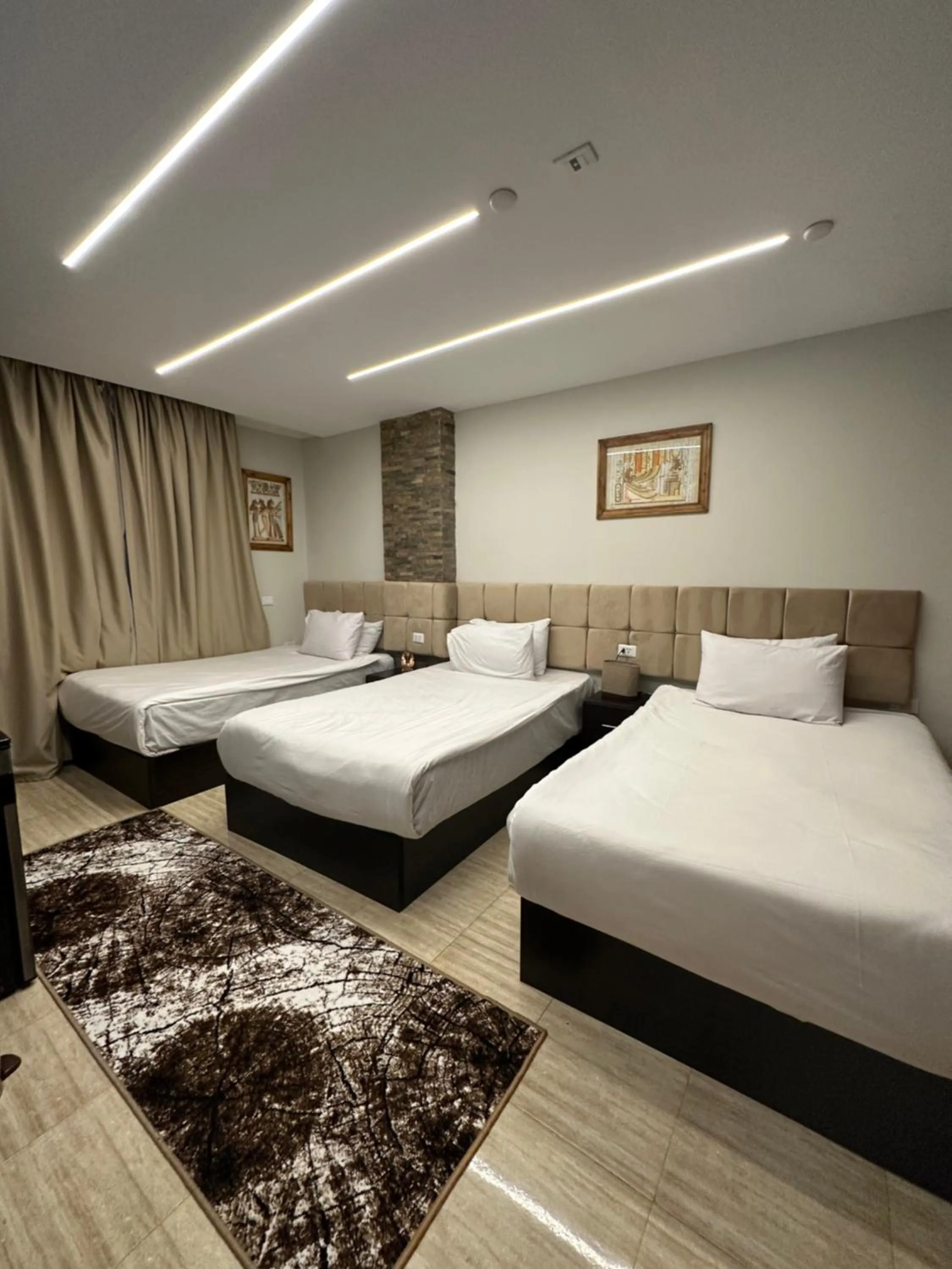 Bed in Crowne Pyramids View inn