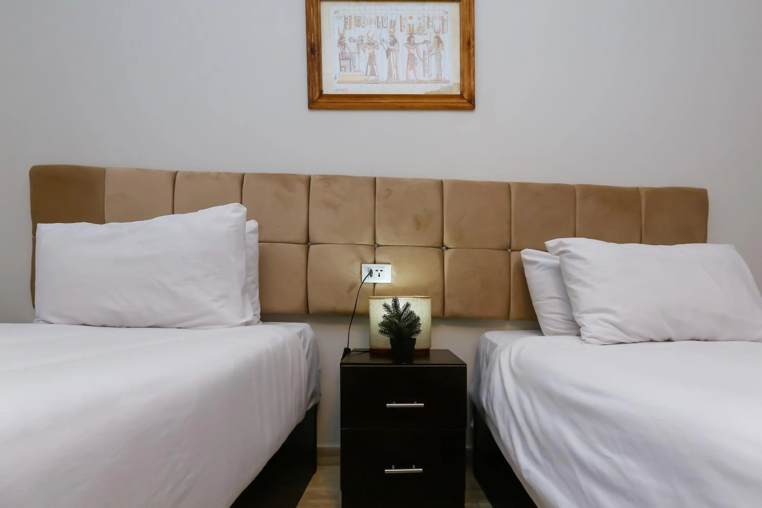 Bed in Crowne Pyramids View inn