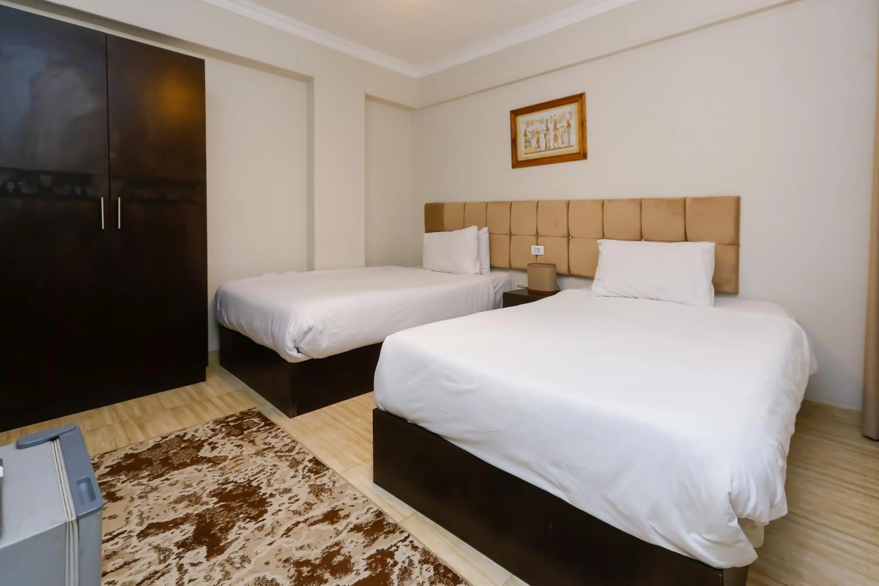 Bed in Crowne Pyramids View inn