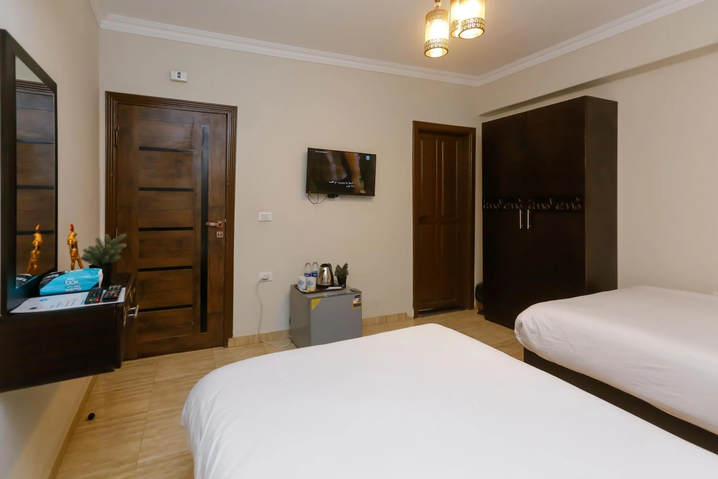 Bed in Crowne Pyramids View inn