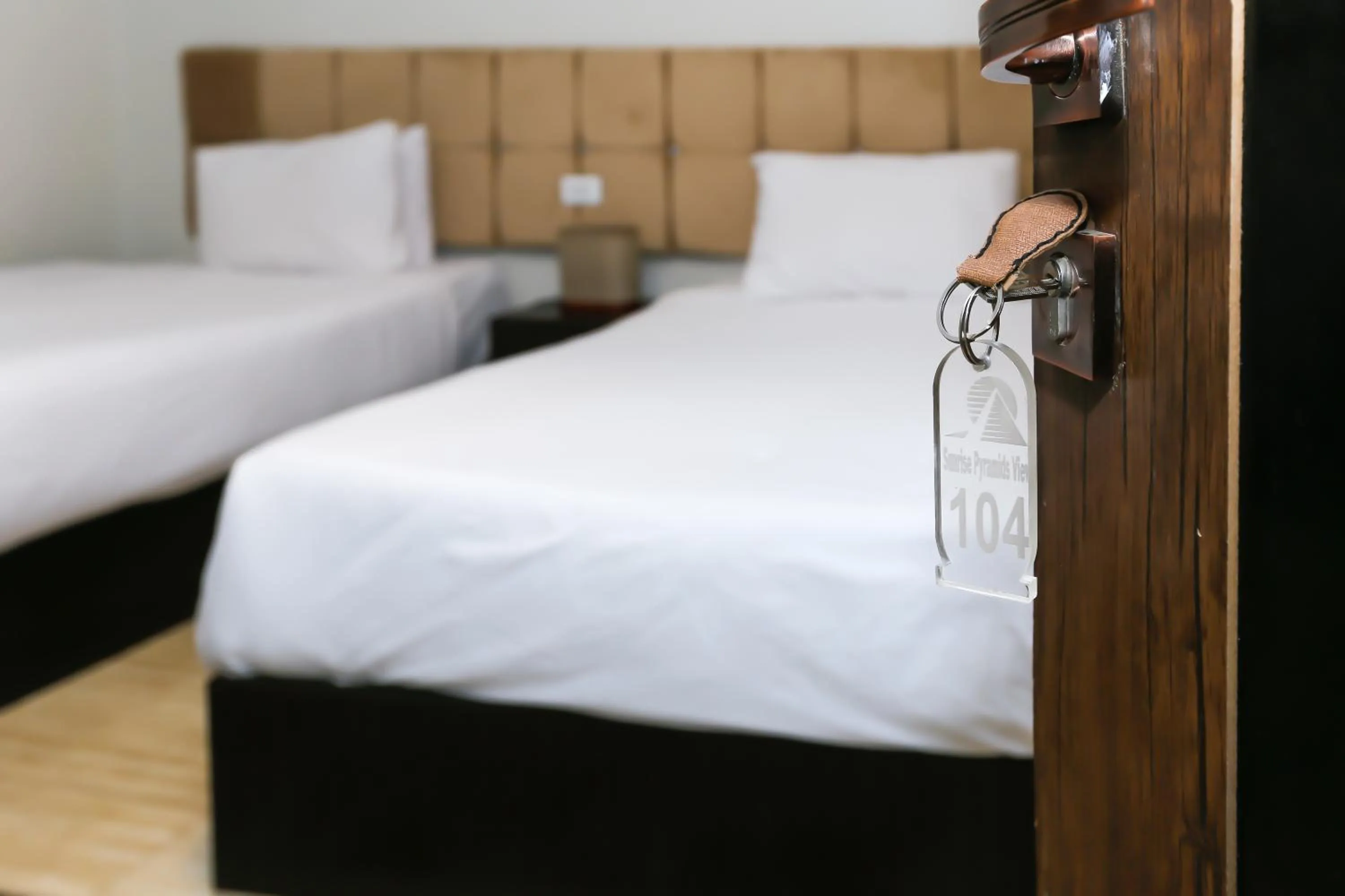 Bed in Crowne Pyramids View inn