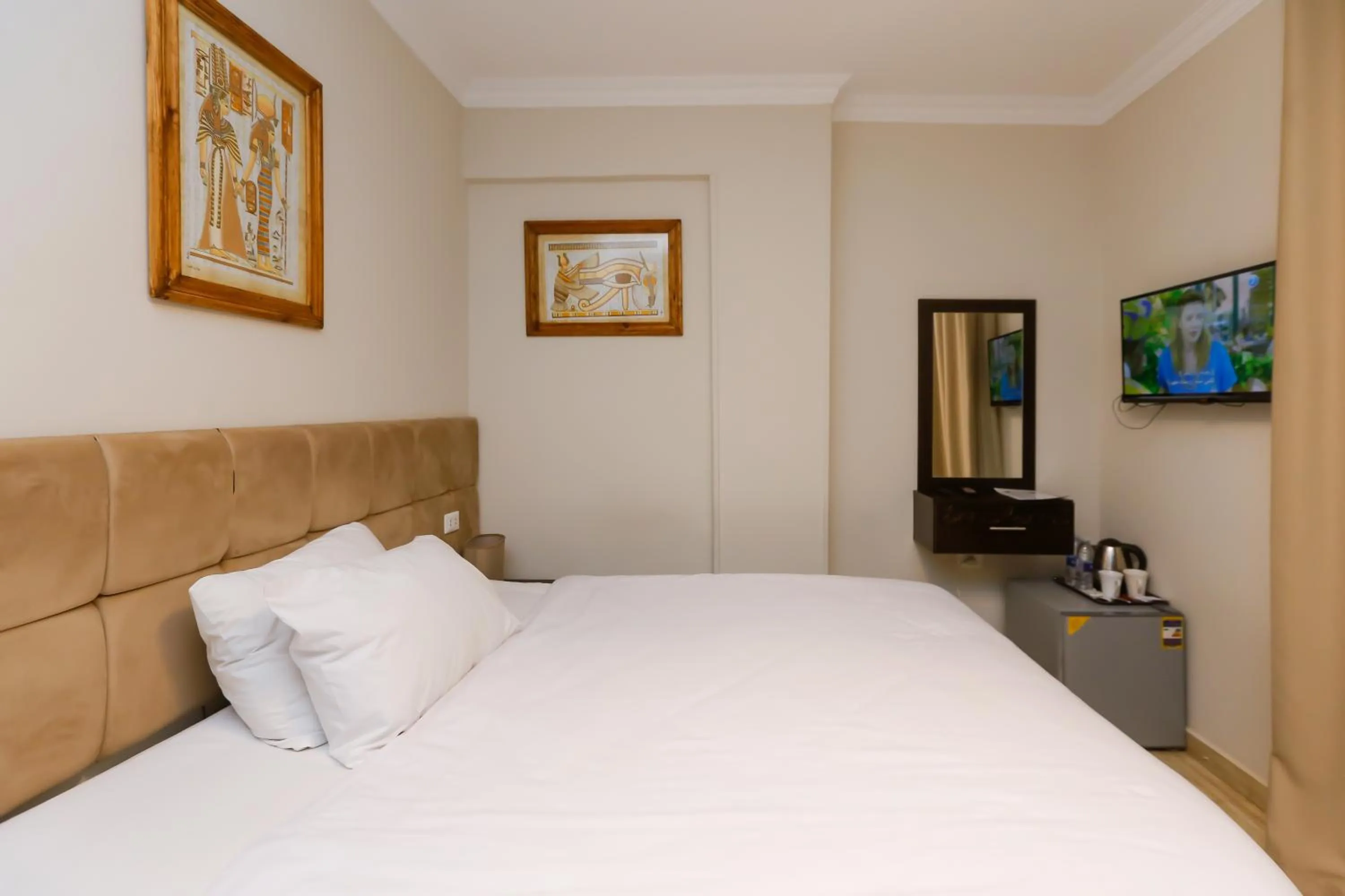 Bed in Crowne Pyramids View inn