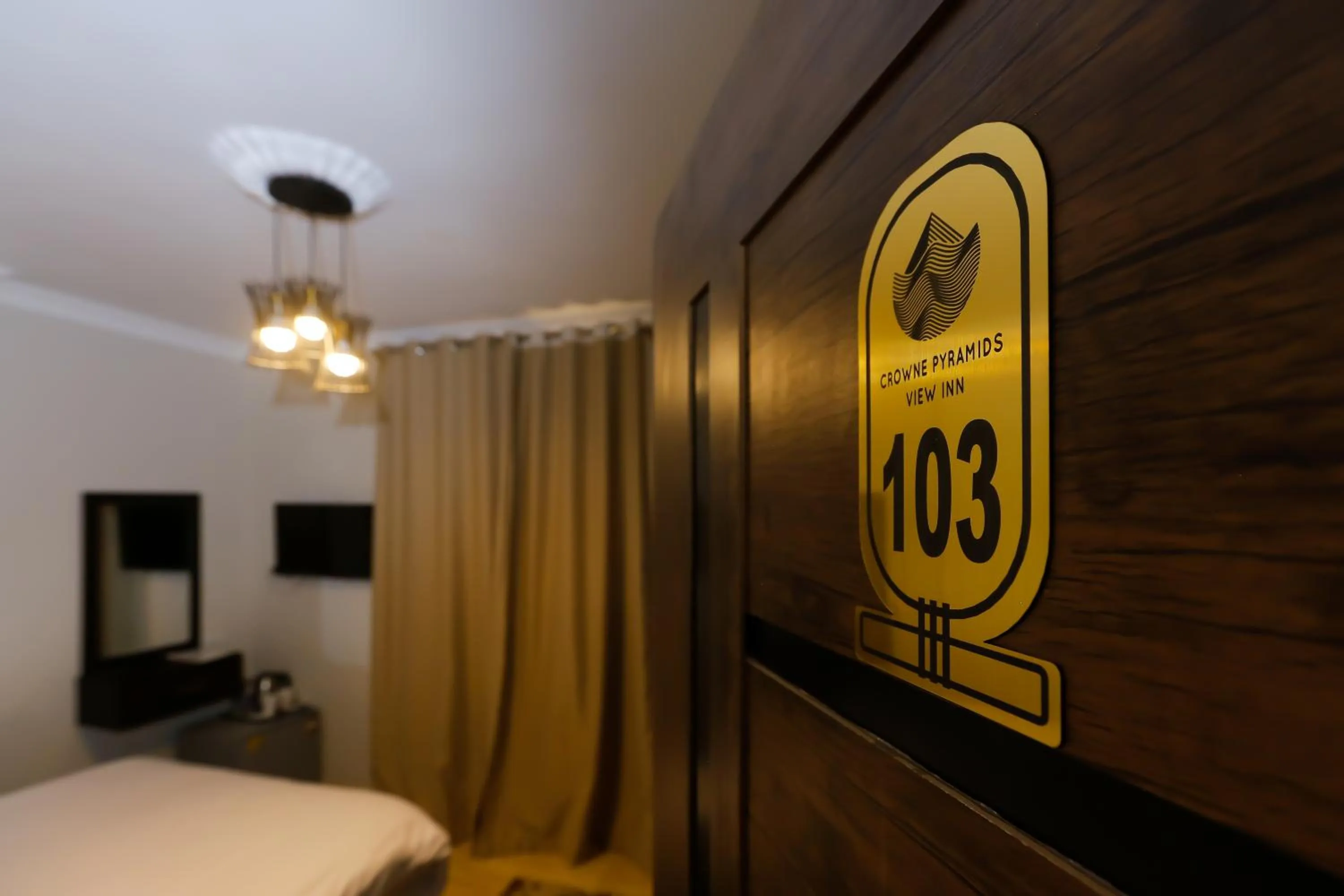 Bed in Crowne Pyramids View inn